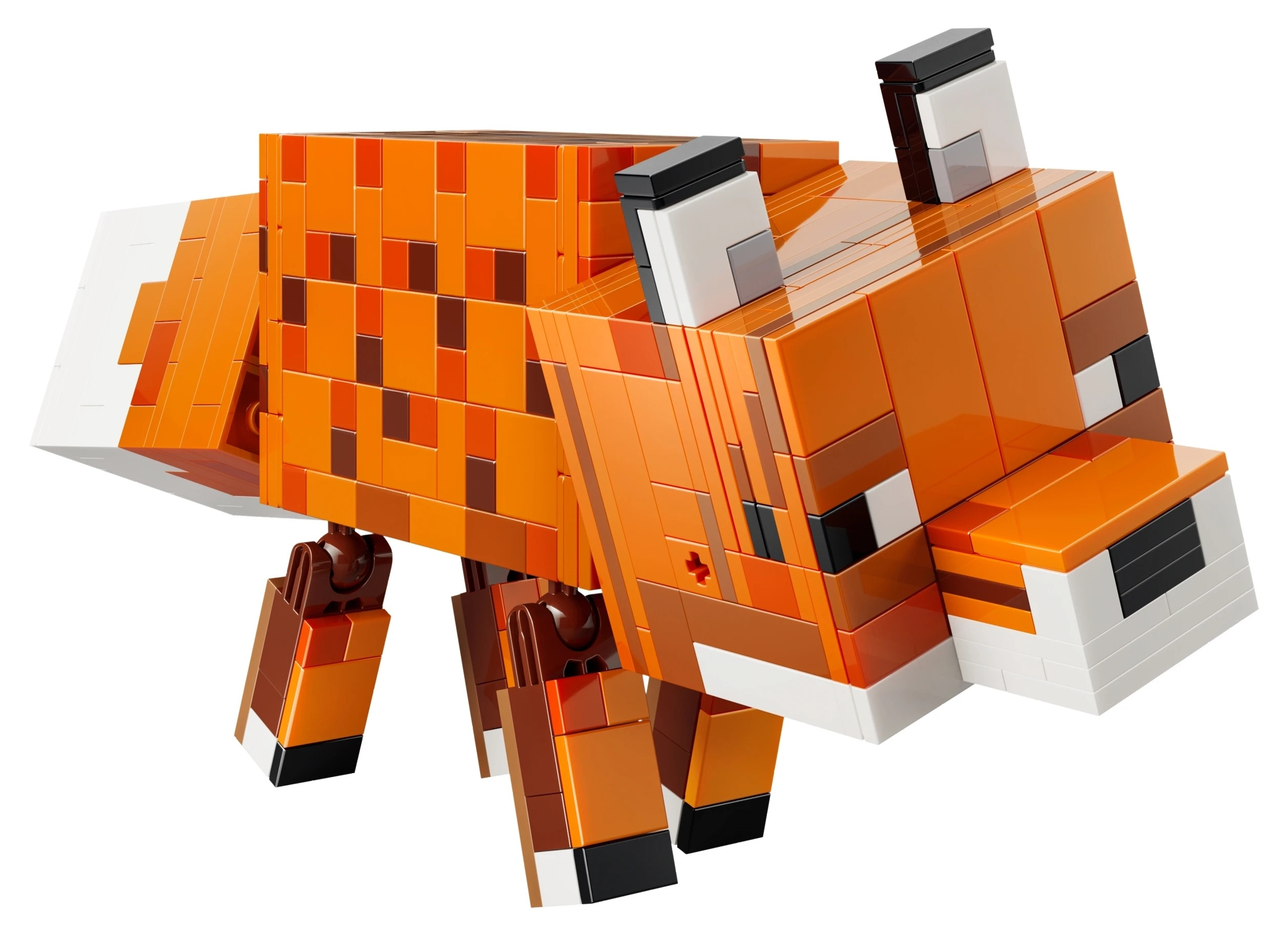 Pomarańczowy lis z klocków Lego z białymi i czarnymi akcentami i brązowymi nogami.