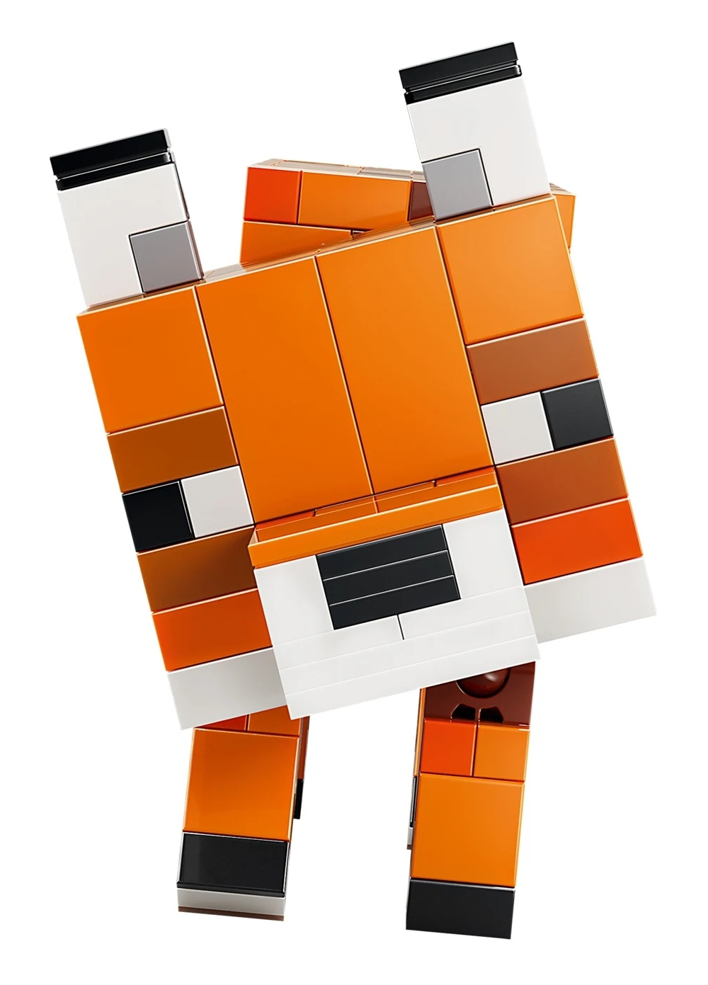 Pomarańczowy lis z Lego z białymi i brązowymi akcentami stoi pionowo.