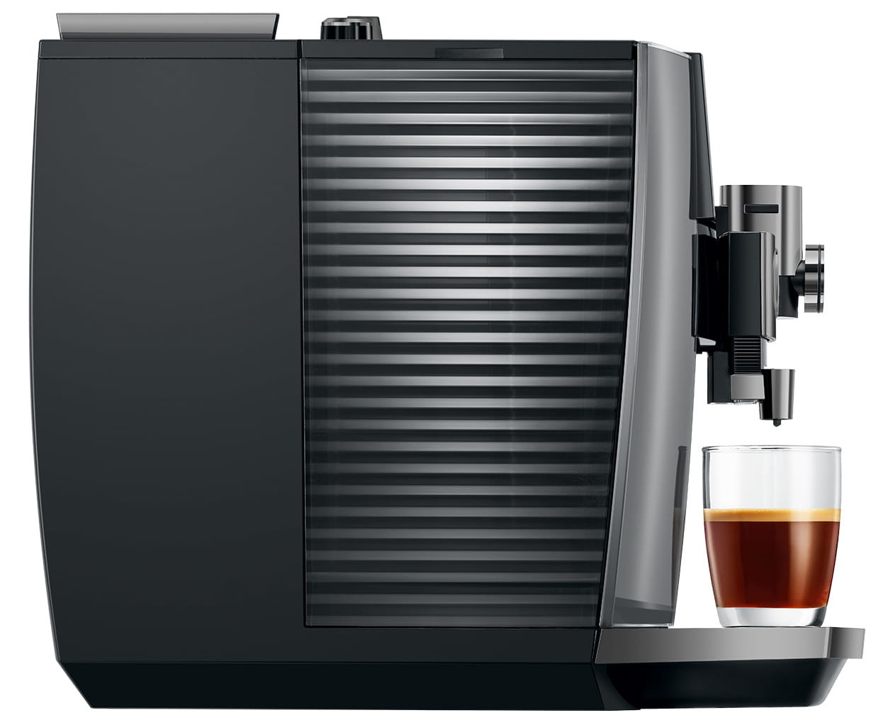 Czarny ekspres do kawy z obok szklanką espresso.