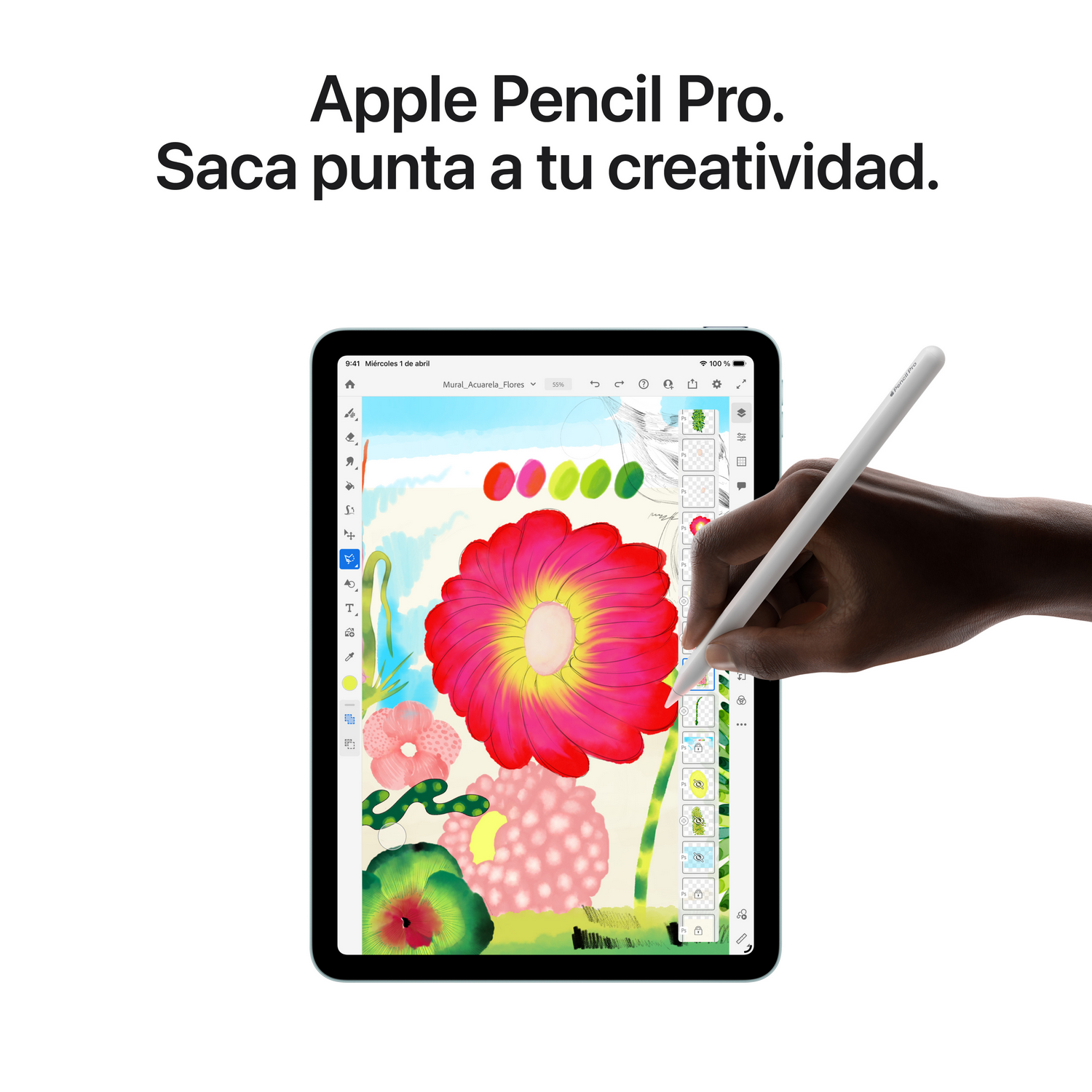 Una mano sostiene un Apple Pencil Pro blanco sobre una tablet con una pintura de flores coloridas.