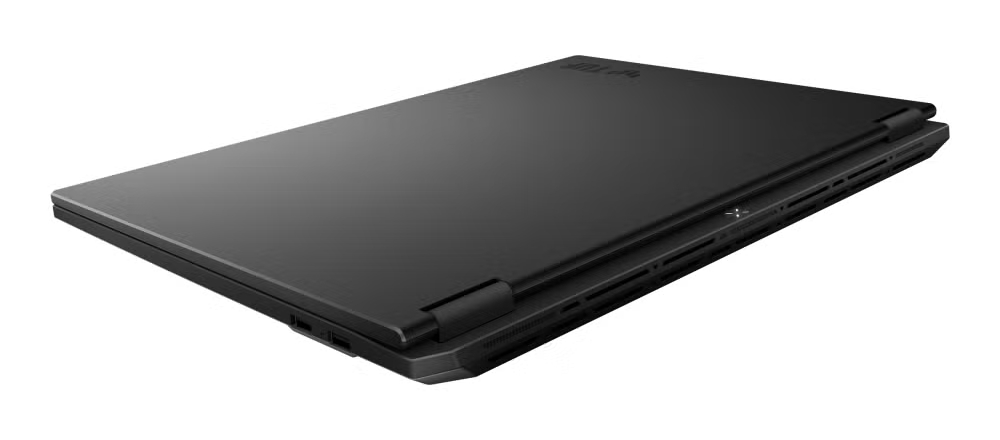 Zamknięty czarny laptop z srebrnym logo na pokrywie.