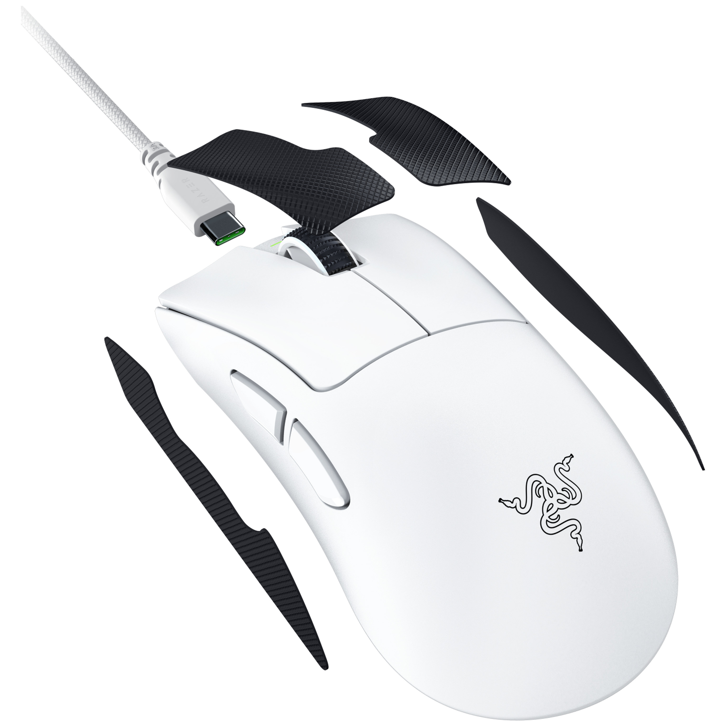 White mouse with black USB-C cable and separate grip stickers.