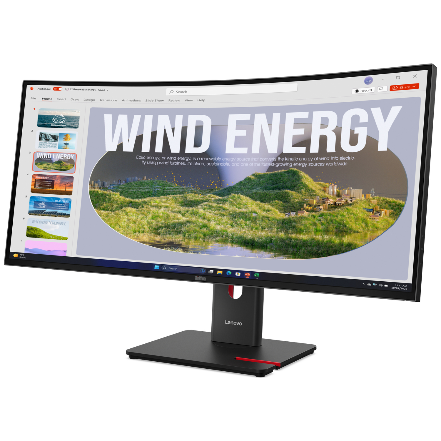 A computer monitor displays a presentation about wind energy featuring turbines and cities.