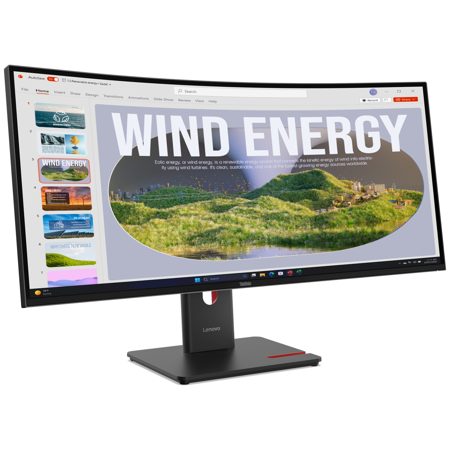 A curved monitor displays a presentation about wind energy.