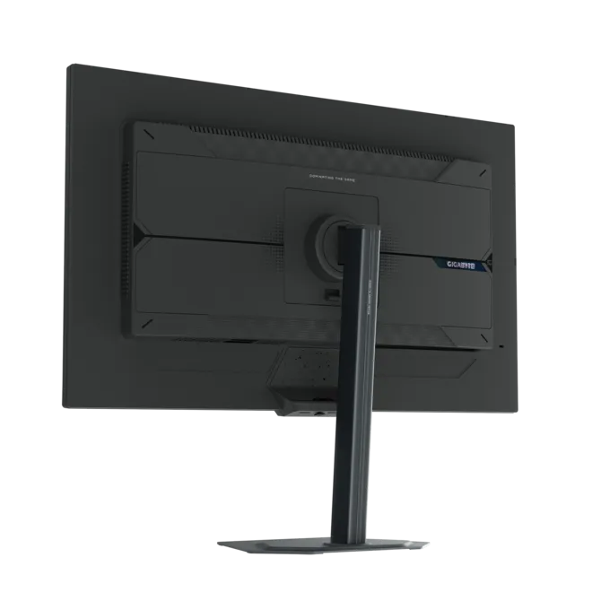 Vista trasera de un monitor negro con logo GIGABYTE y soporte.