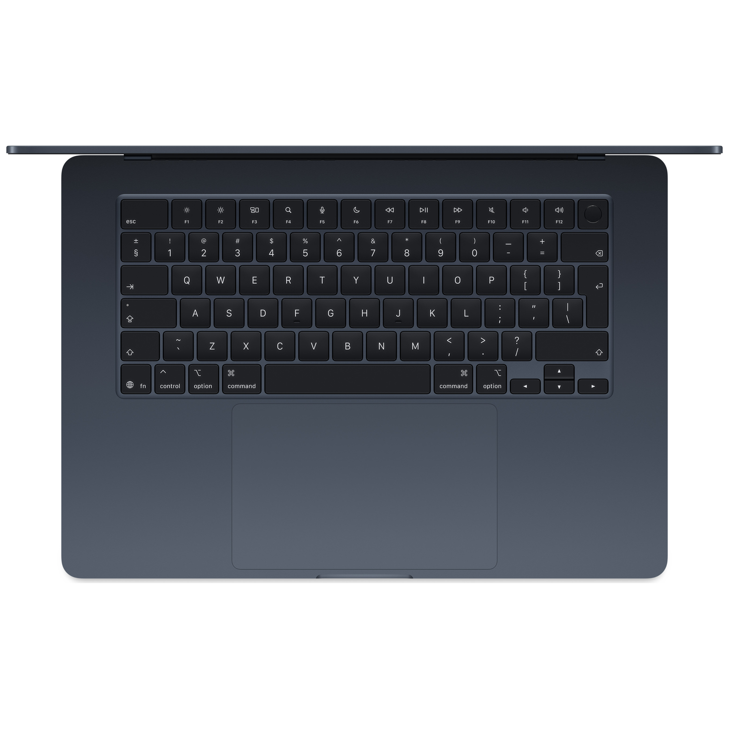 Un ordinateur portable sombre et fermé montrant le clavier et le pavé tactile.