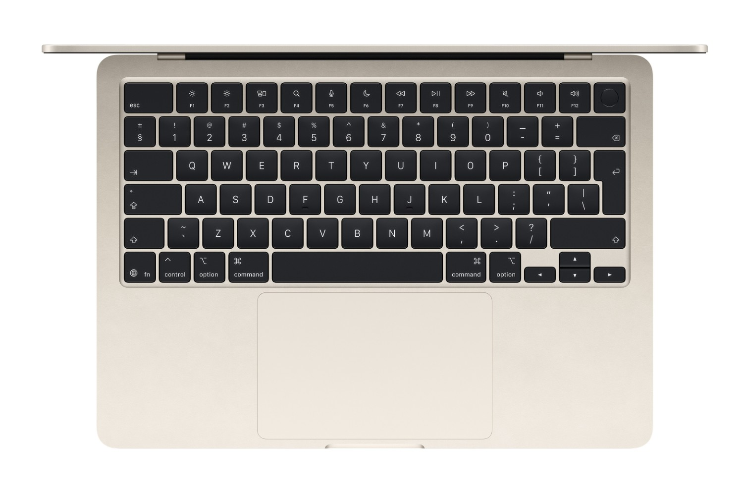 Jasnozłoty laptop z widoczną klawiaturą i gładzikiem.