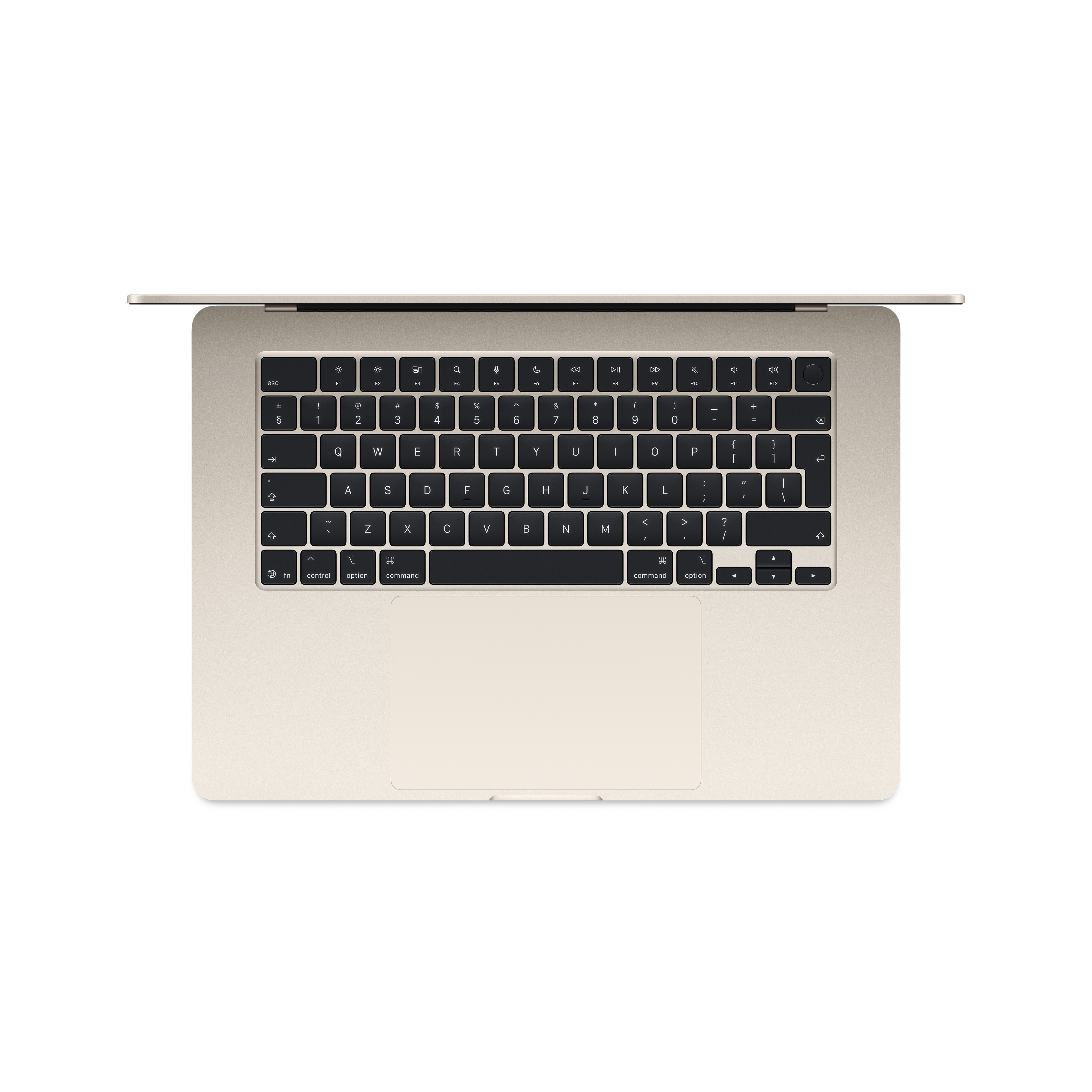 Ein beiger Laptop ist geöffnet und zeigt von oben die Tastatur und das Trackpad.