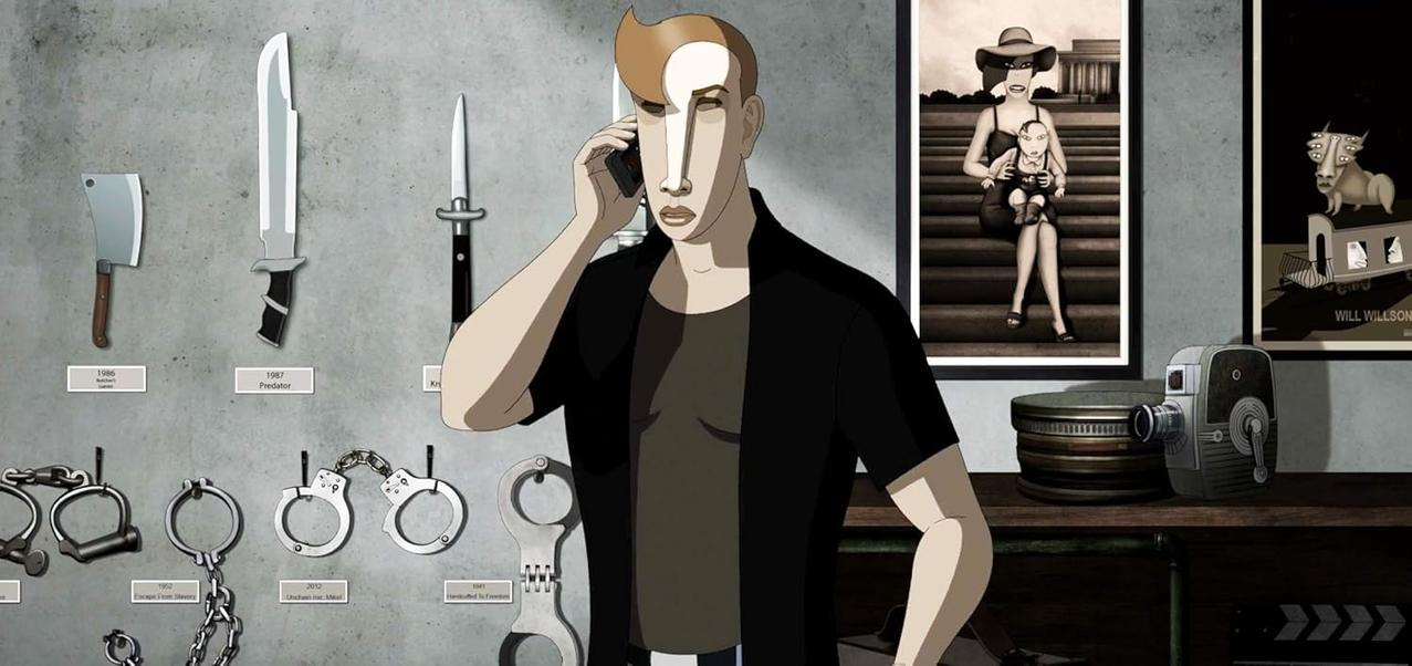 Ein Mann mit auffälliger Frisur telefoniert vor einer Wand mit Waffen und Handschellen.