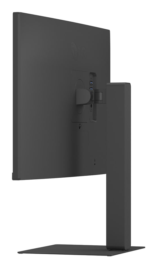 Tył czarnego monitora ze stojakiem i portami.