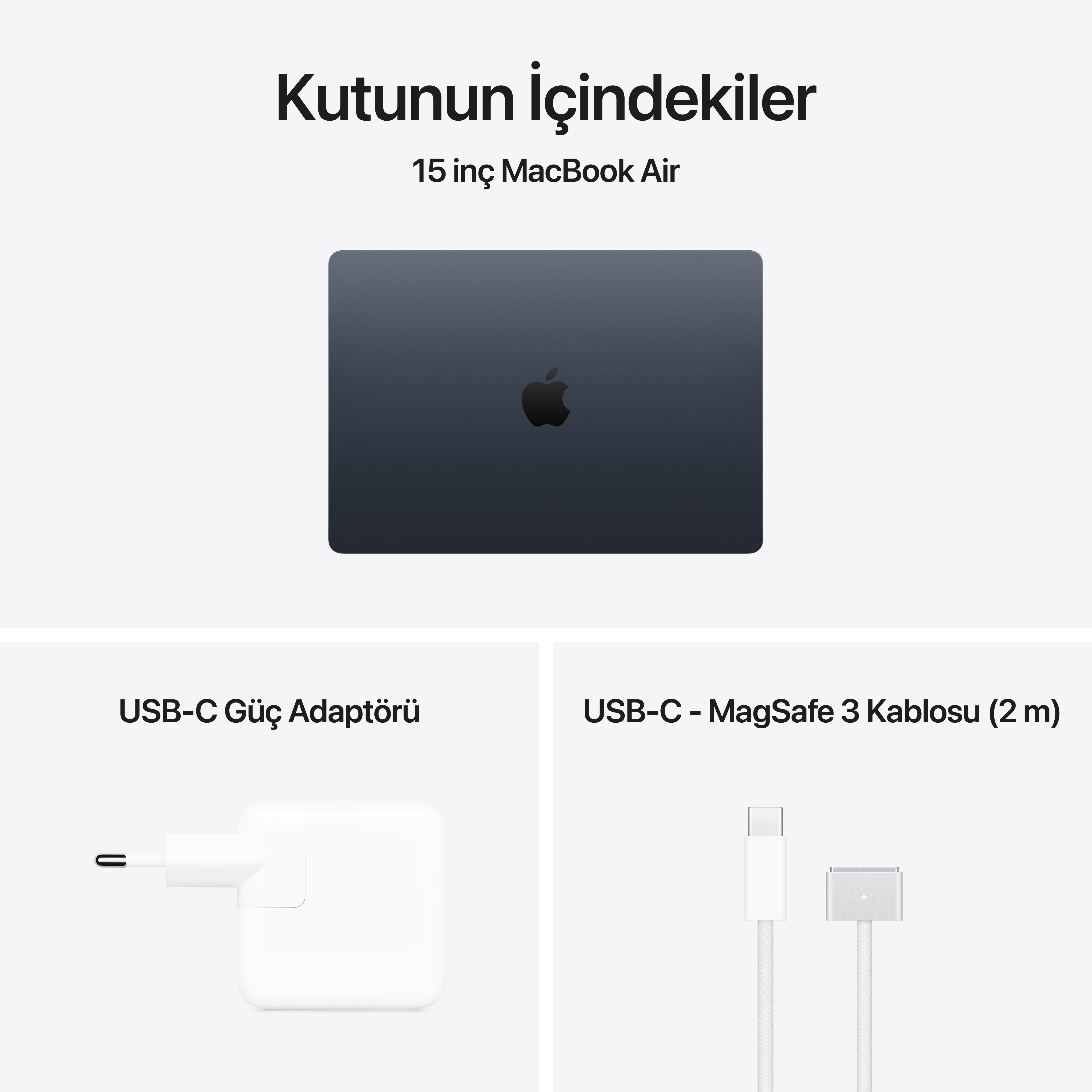 Apple logosu, güç adaptörü ve şarj kablosu olan koyu gri MacBook Air.
