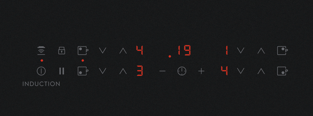 Płyta indukcyjna z czerwonymi wyświetlaczami cyfrowymi mocy i czasu.