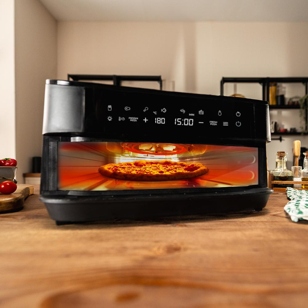 Una pizza redonda con queso derretido se hornea dentro de un horno negro. Pantalla digital.