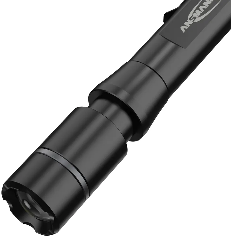 Lampe de poche noire avec lettrage argenté.
