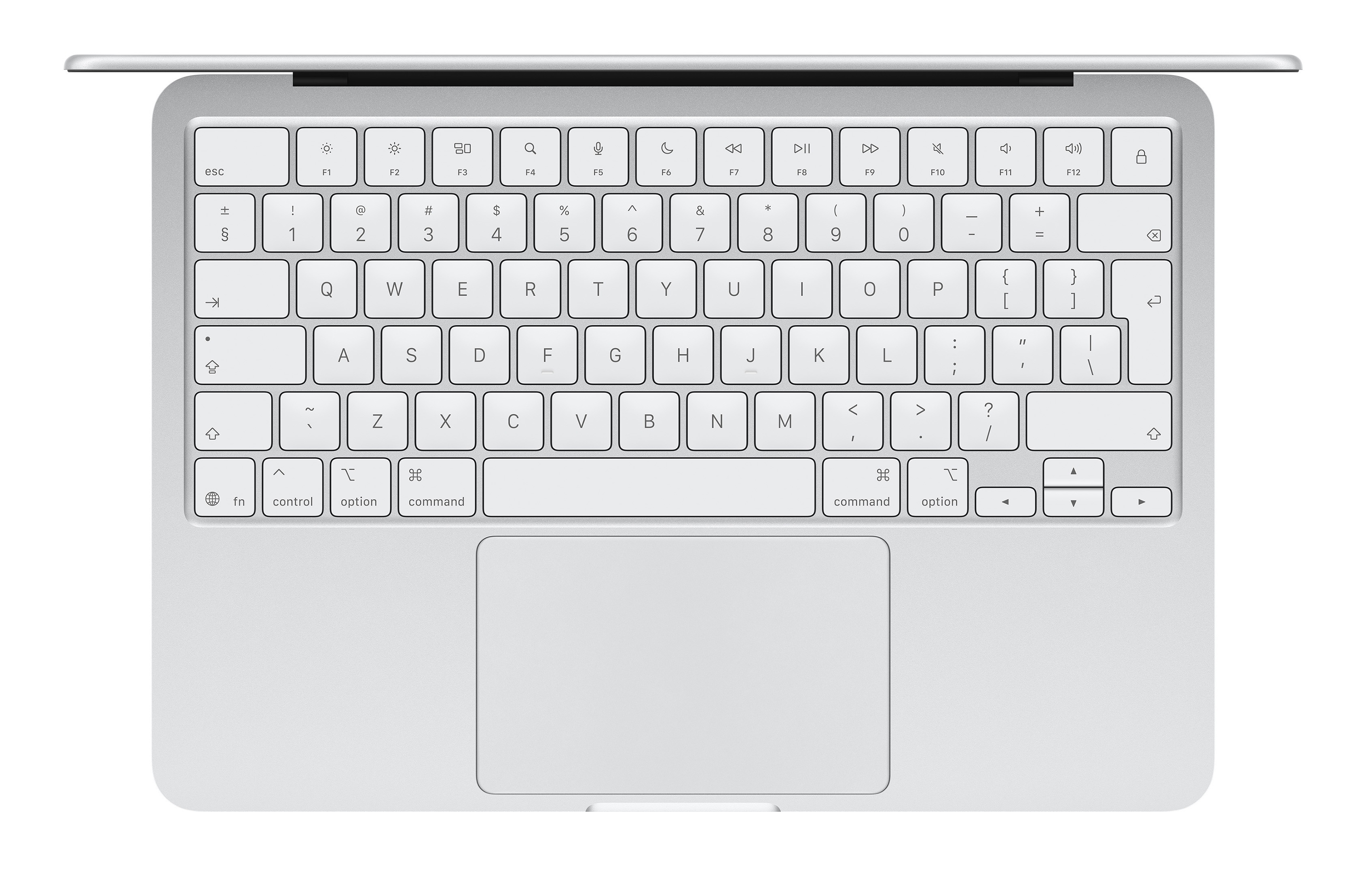 Zbliżenie na srebrną klawiaturę i gładzik laptopa.