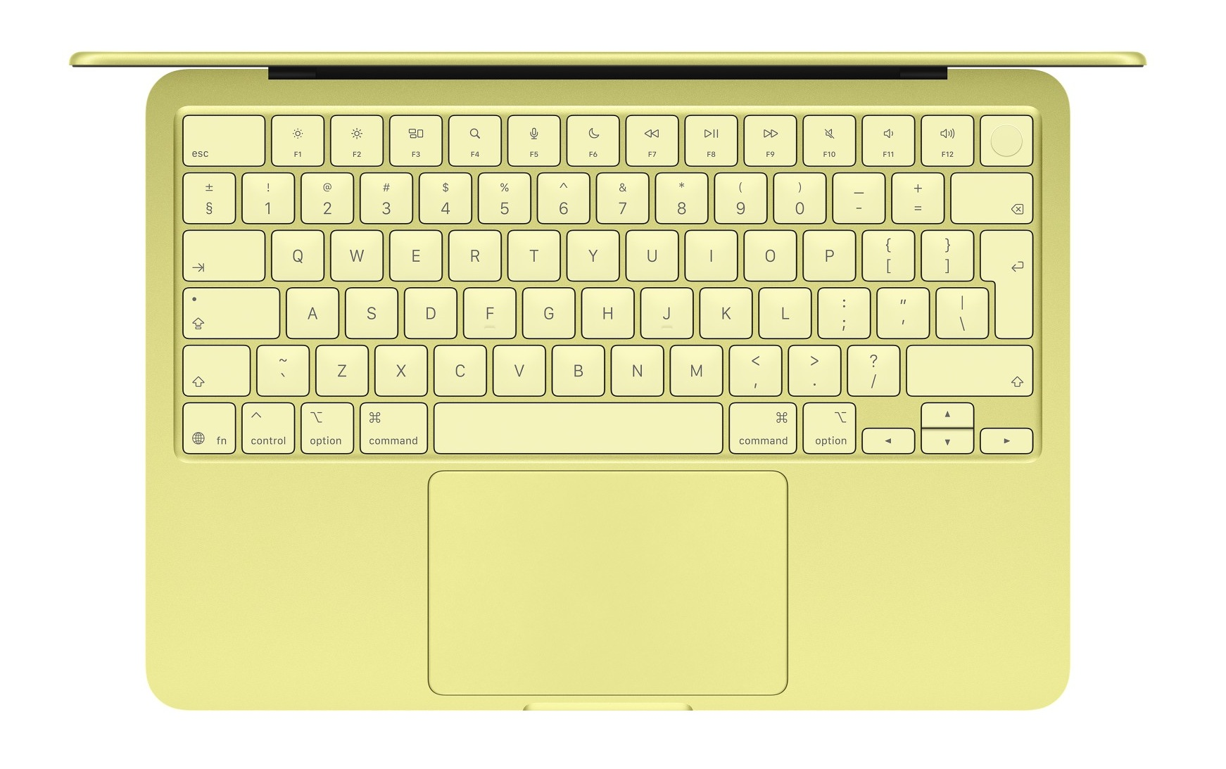 Żółta klawiatura laptopa i duży touchpad, widok z góry.
