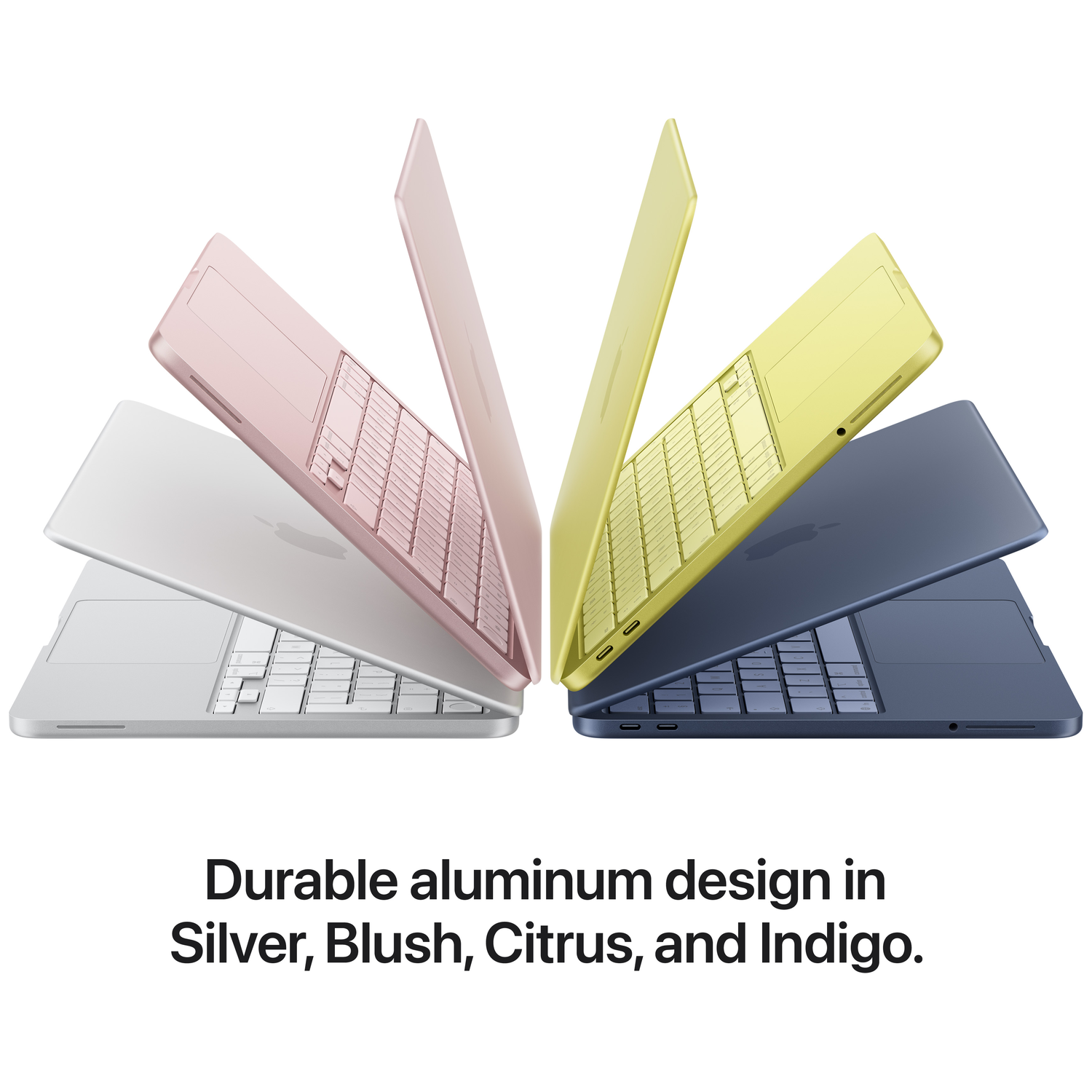 Vier laptops in roze, geel, donkerblauw en zilver op witte achtergrond.