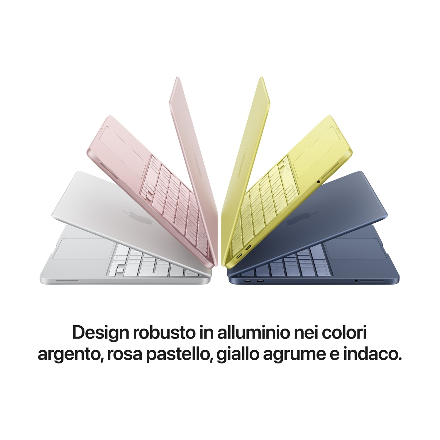 Quattro laptop esposti nei colori argento, rosa, giallo e blu navy.