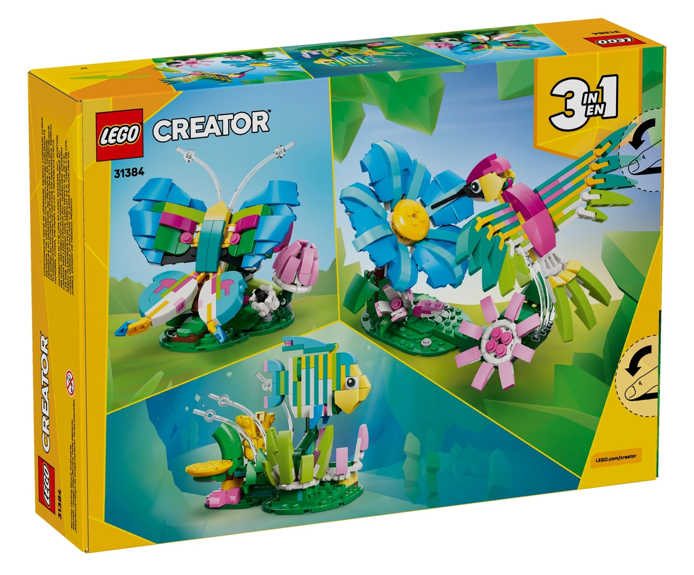 Pudełko Lego Creator z motylem, kolibrem i rybą wykonanymi z kolorowych klocków.