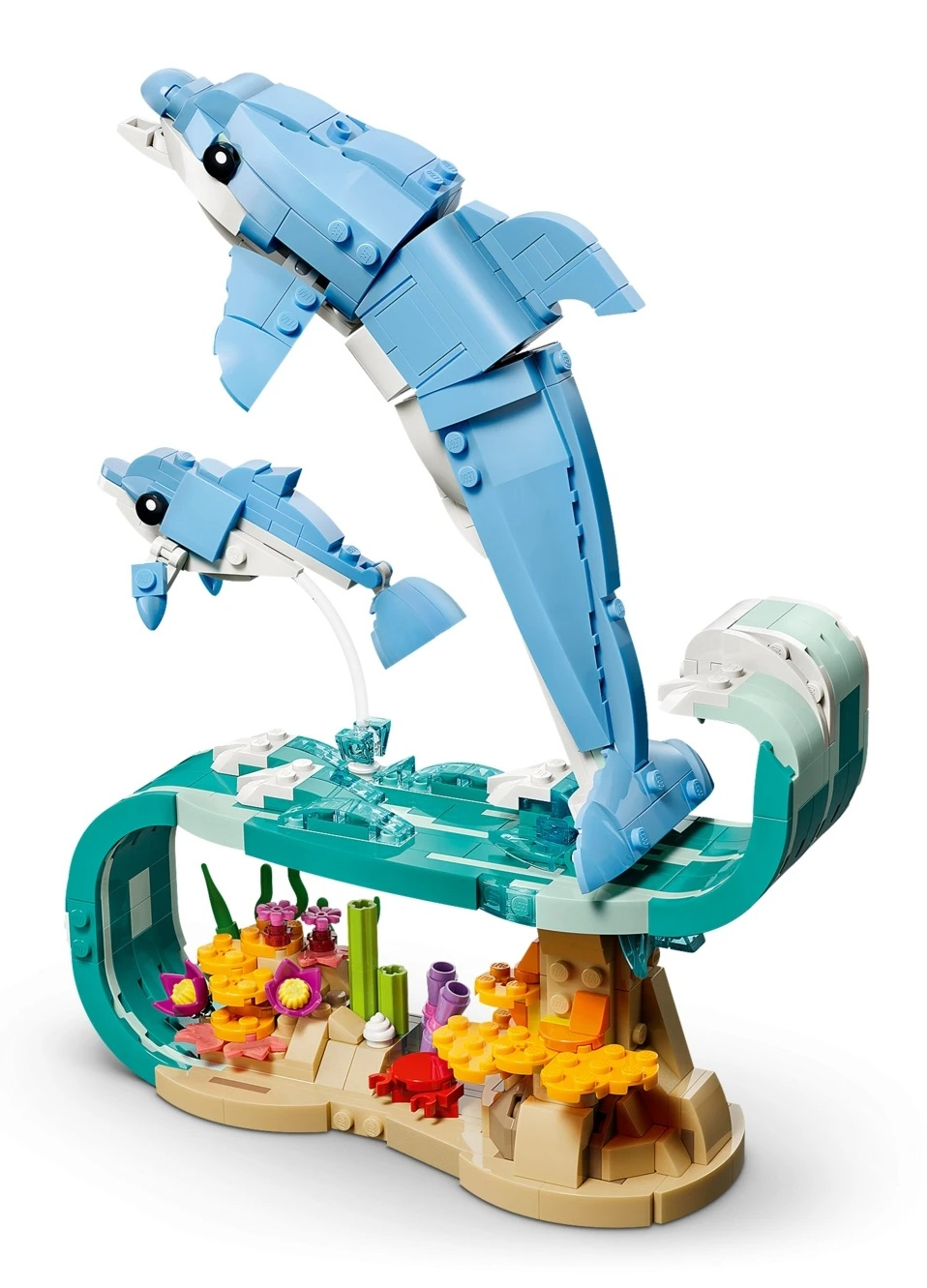 Dwa delfiny Lego wyskakują z wody nad rafą koralową z krabem.
