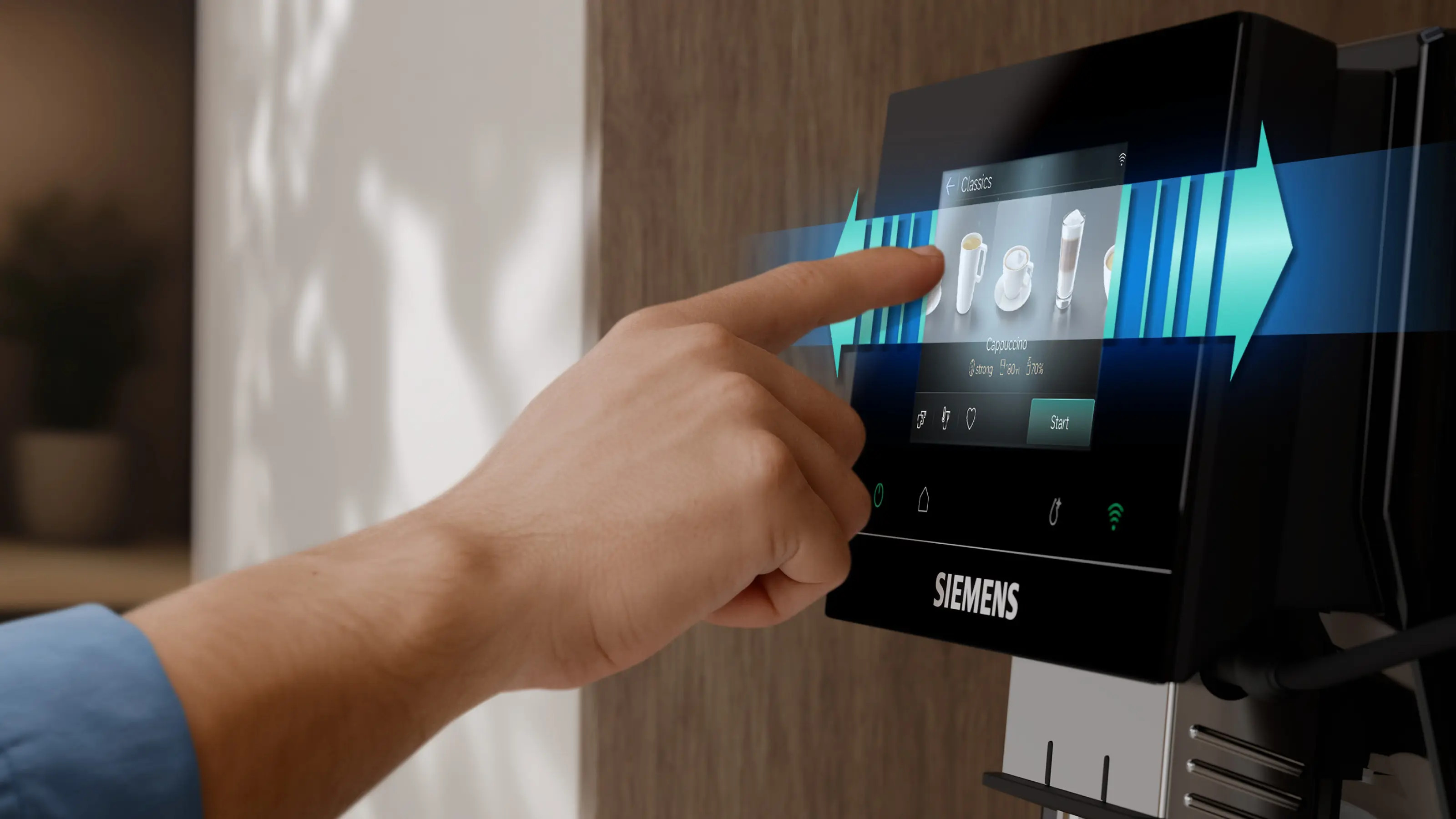 Ręka obsługuje wyświetlacz ekspresu Siemens, wybierając Cappuccino.
