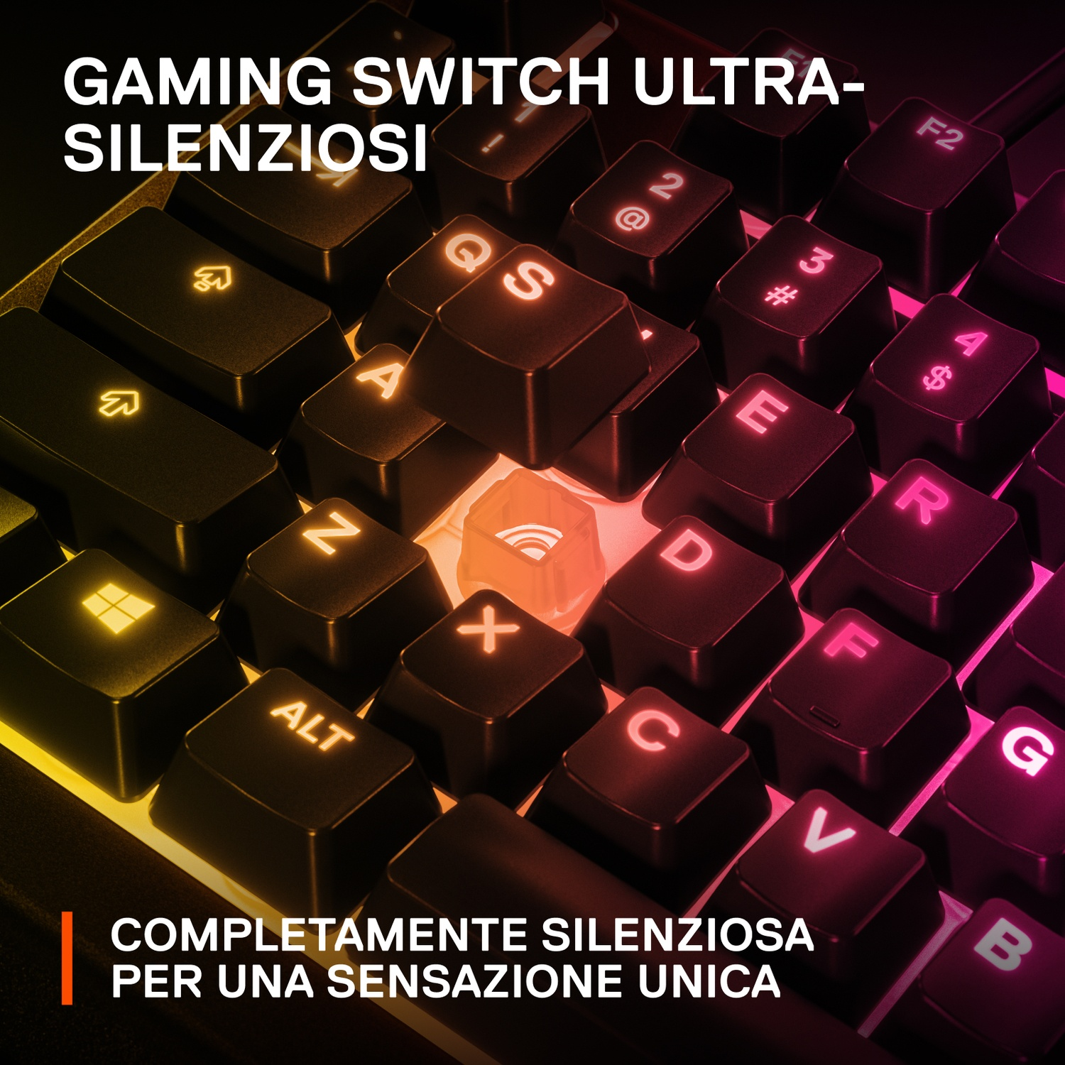 Primo piano di una tastiera retroilluminata con tasti Q, S, A, Z, X, C, V, B, F, R, E, D, G e tasti funzione.