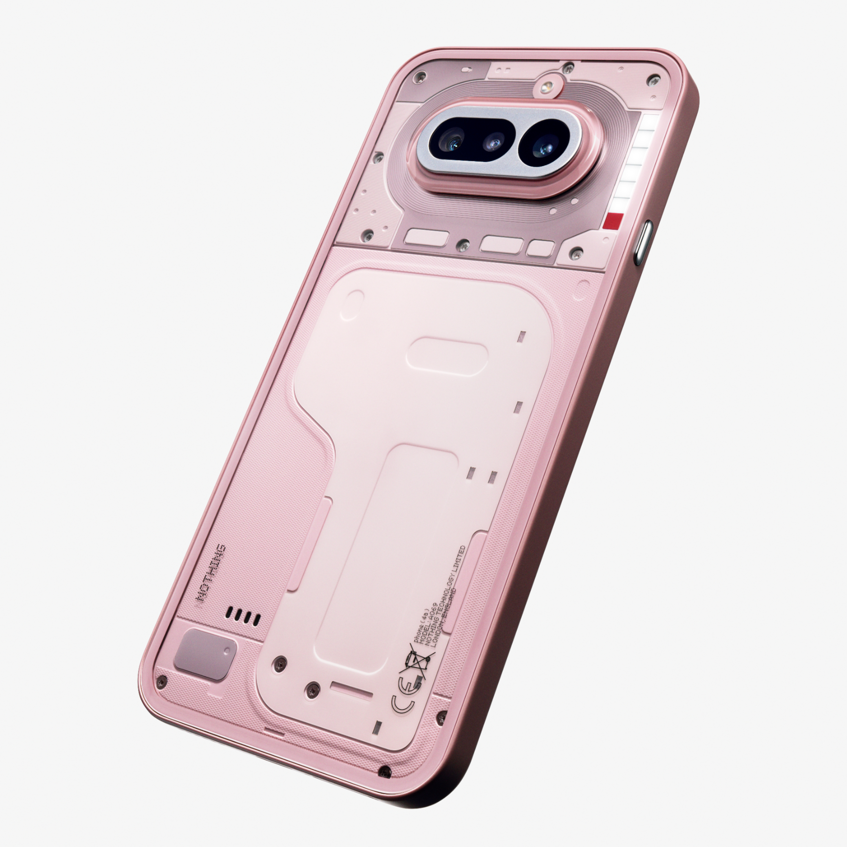 Ein rosafarbener Handy-Case mit transparenter Rückseite und sichtbaren Komponenten.