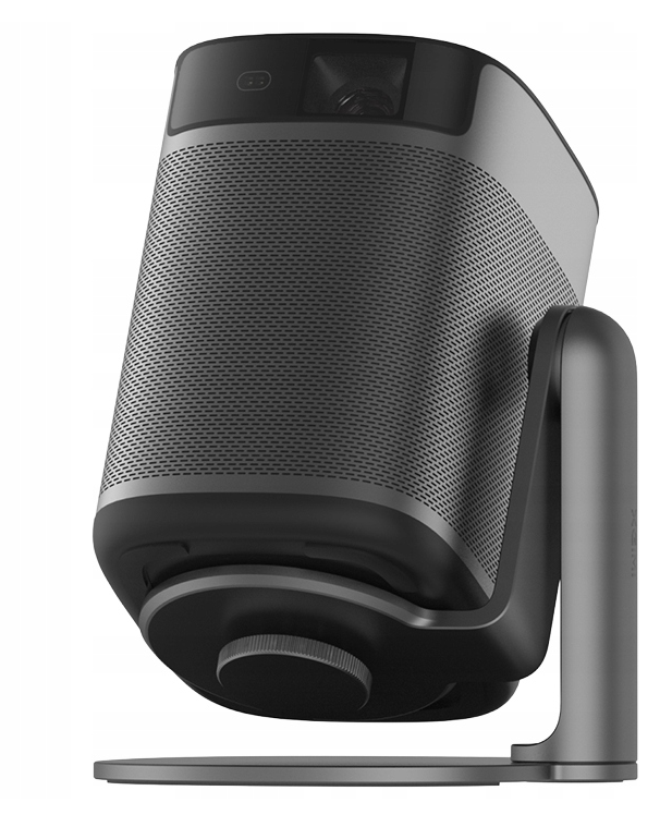 Szary projektor z kratką głośnika i obiektywem na stojaku.