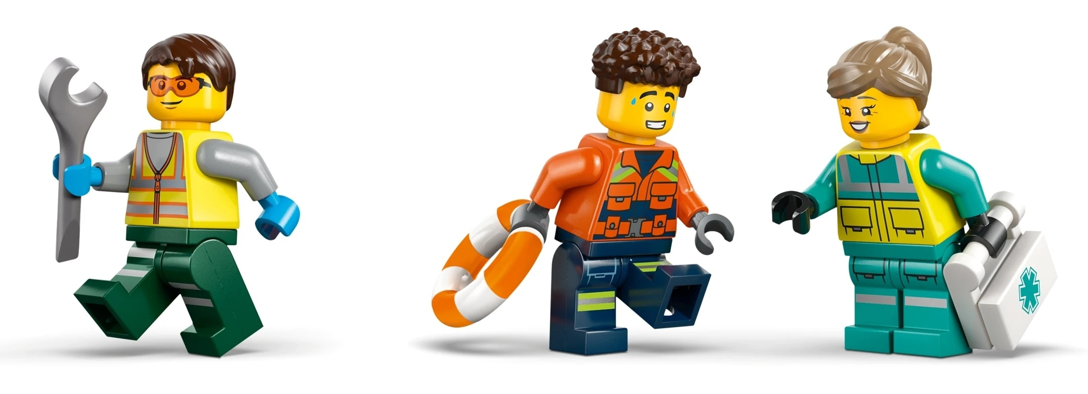 Trzy figurki Lego: mechanik z kluczem, ratownik z kołem ratunkowym, medyk z apteczką.
