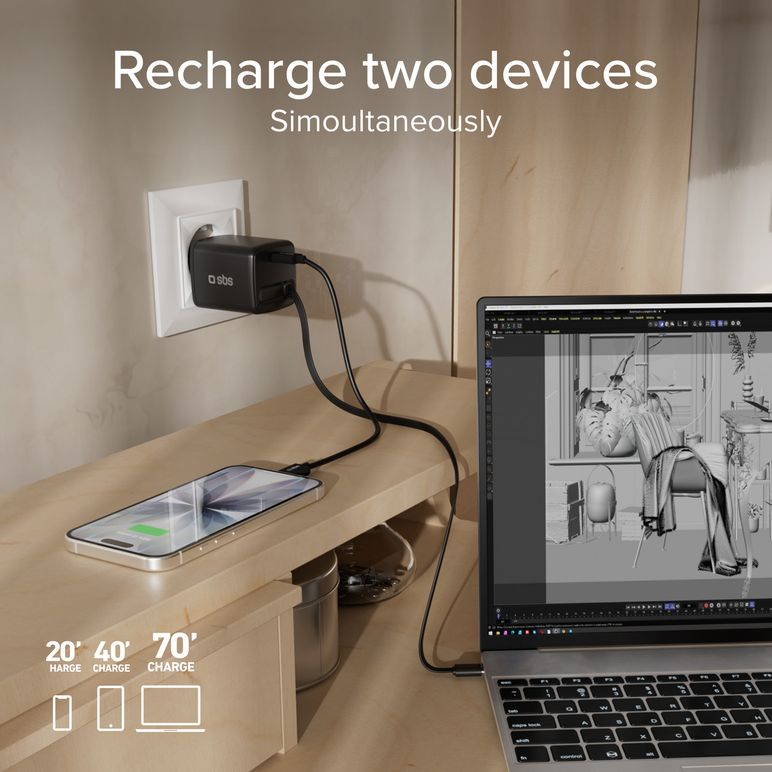 Black charger plugs into wall, charging phone and laptop simultaneously.