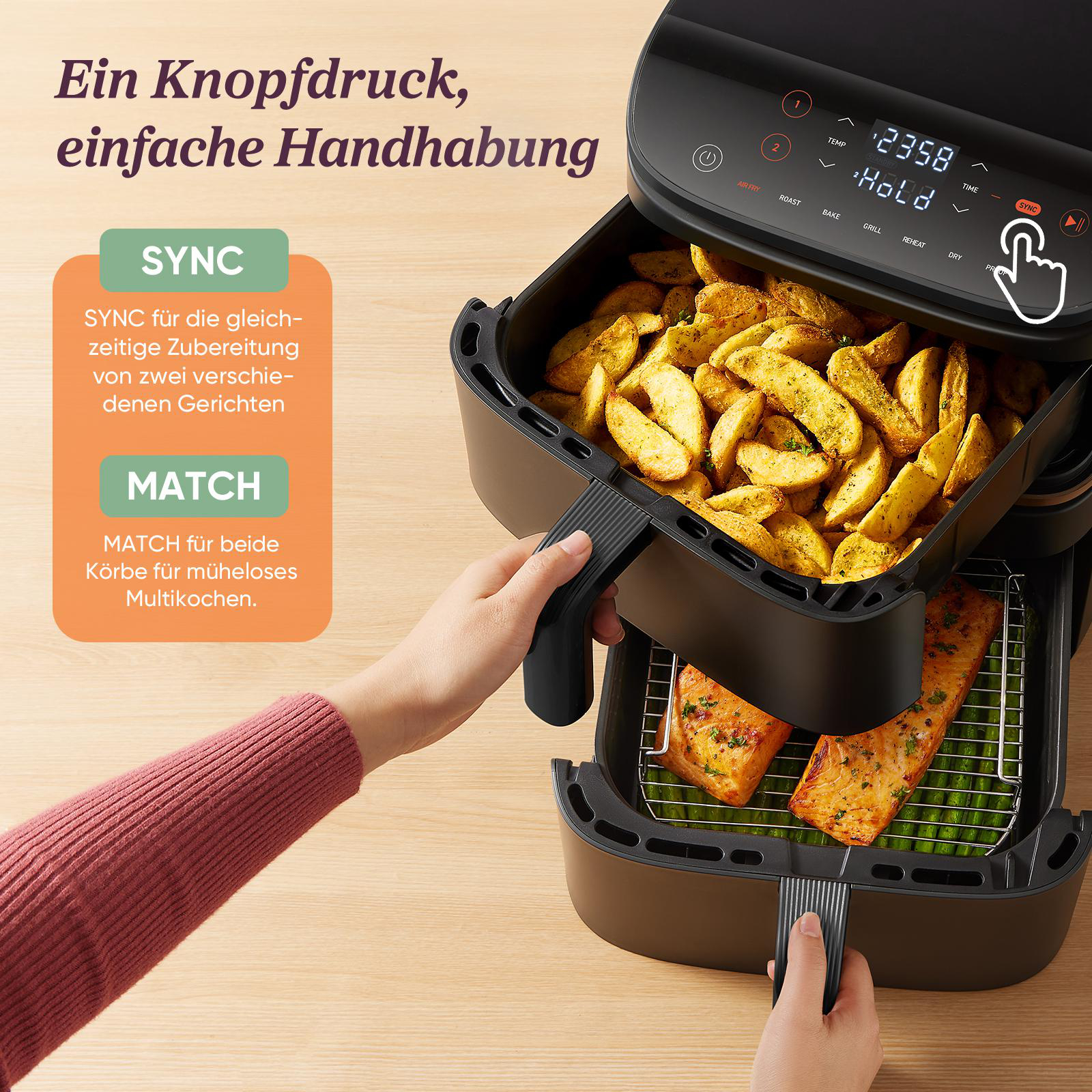 Doppel-Heißluftfritteuse mit Pommes und Lachs auf Spargel.