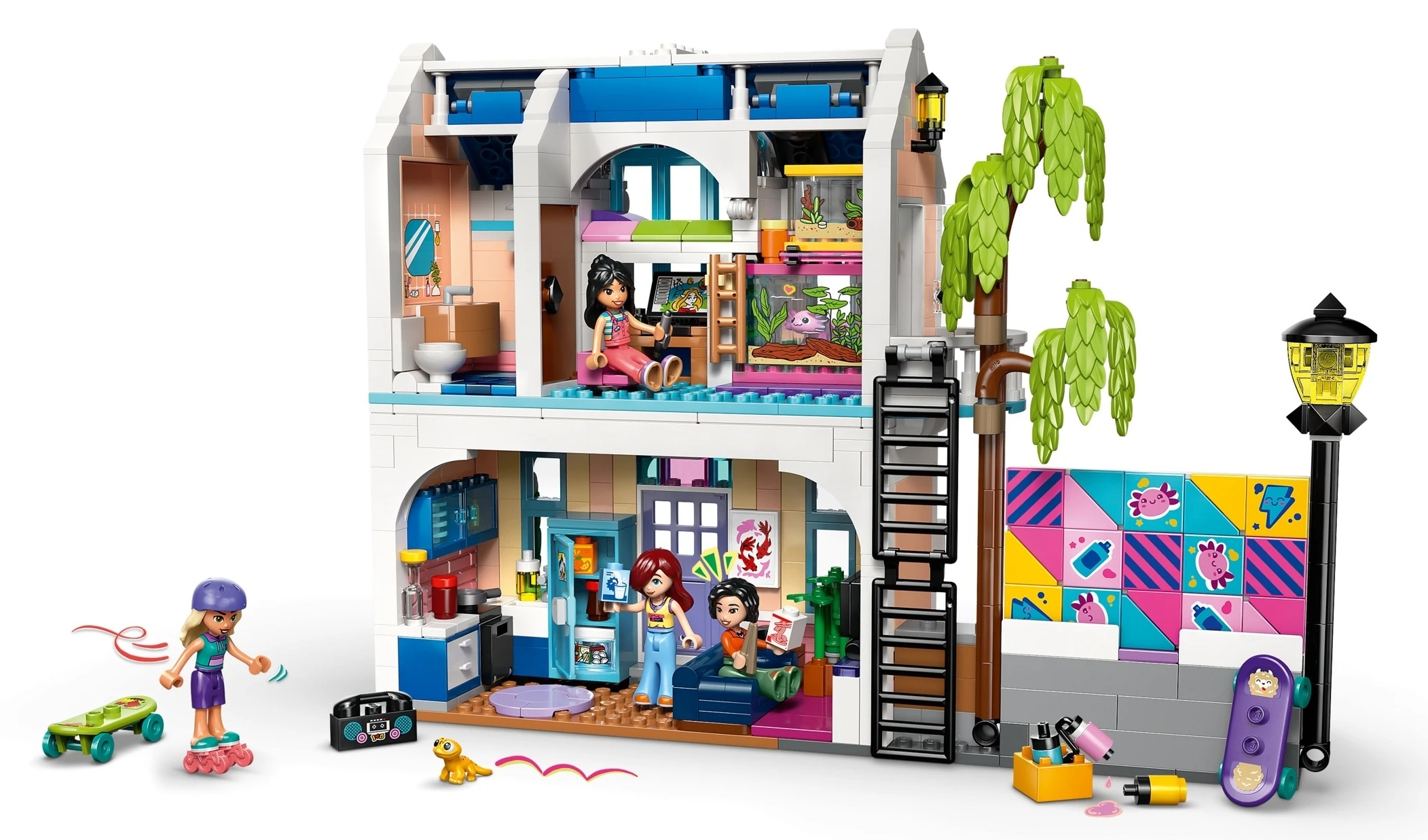 Wielopiętrowy dom Lego z figurkami, meblami, akwarium i częścią zewnętrzną.