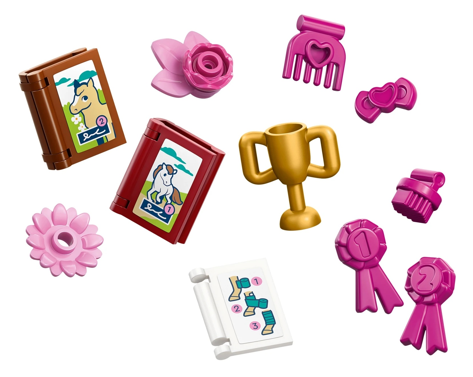 Złote trofeum, książki z końmi, kwiaty, wstążki i nagrody.