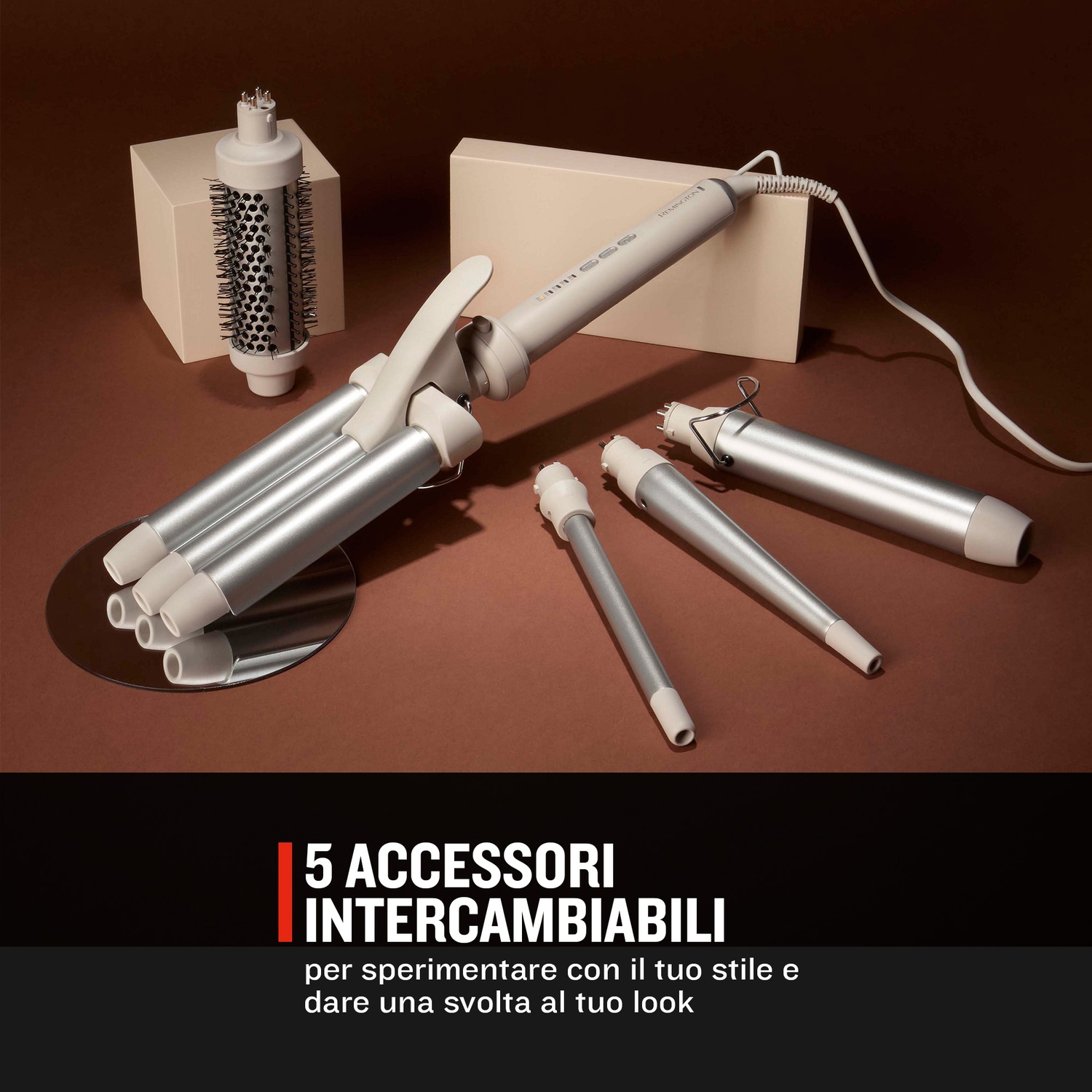 Un set styler per capelli con più accessori e un accessorio a spazzola.