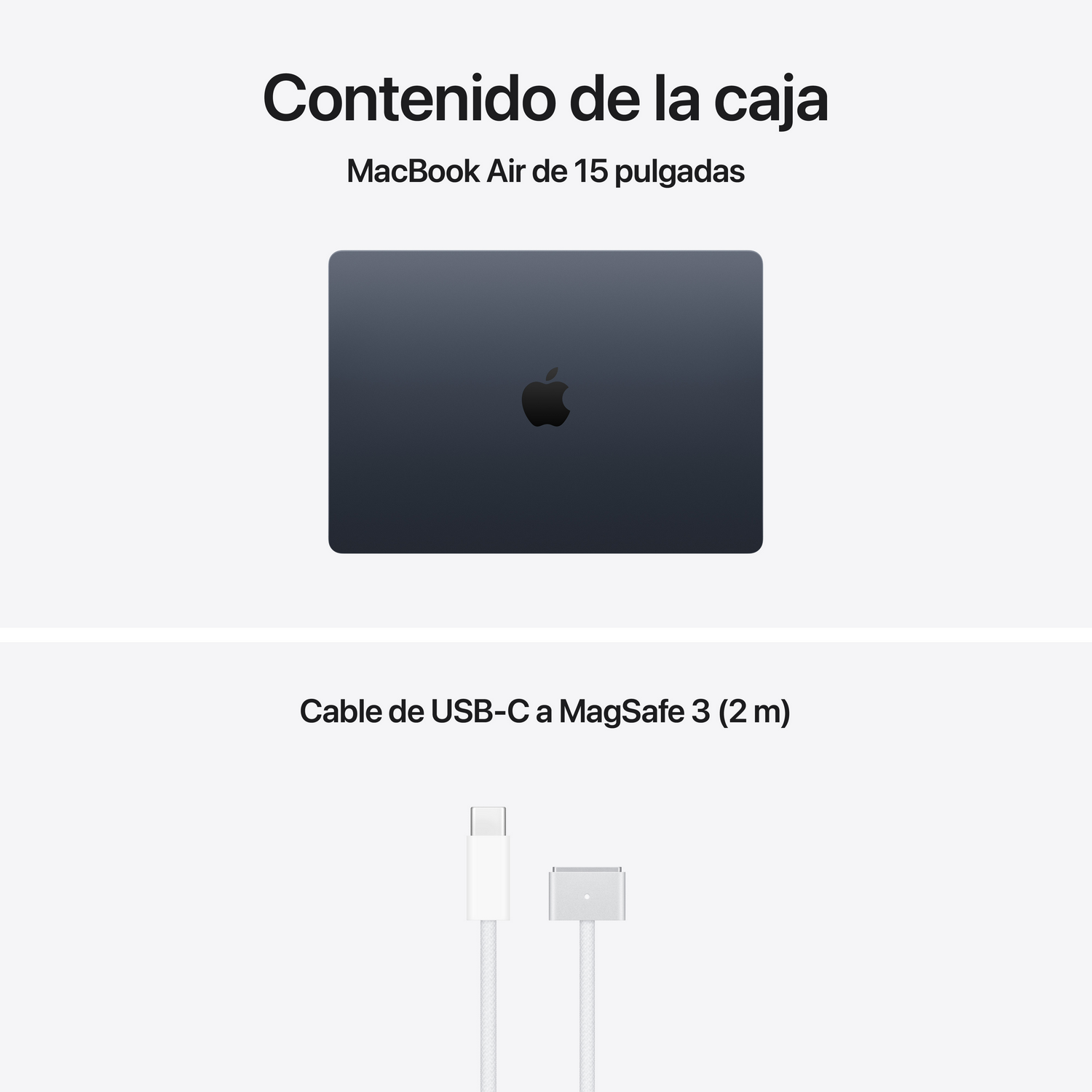 Un MacBook Air oscuro y un cable de carga blanco.