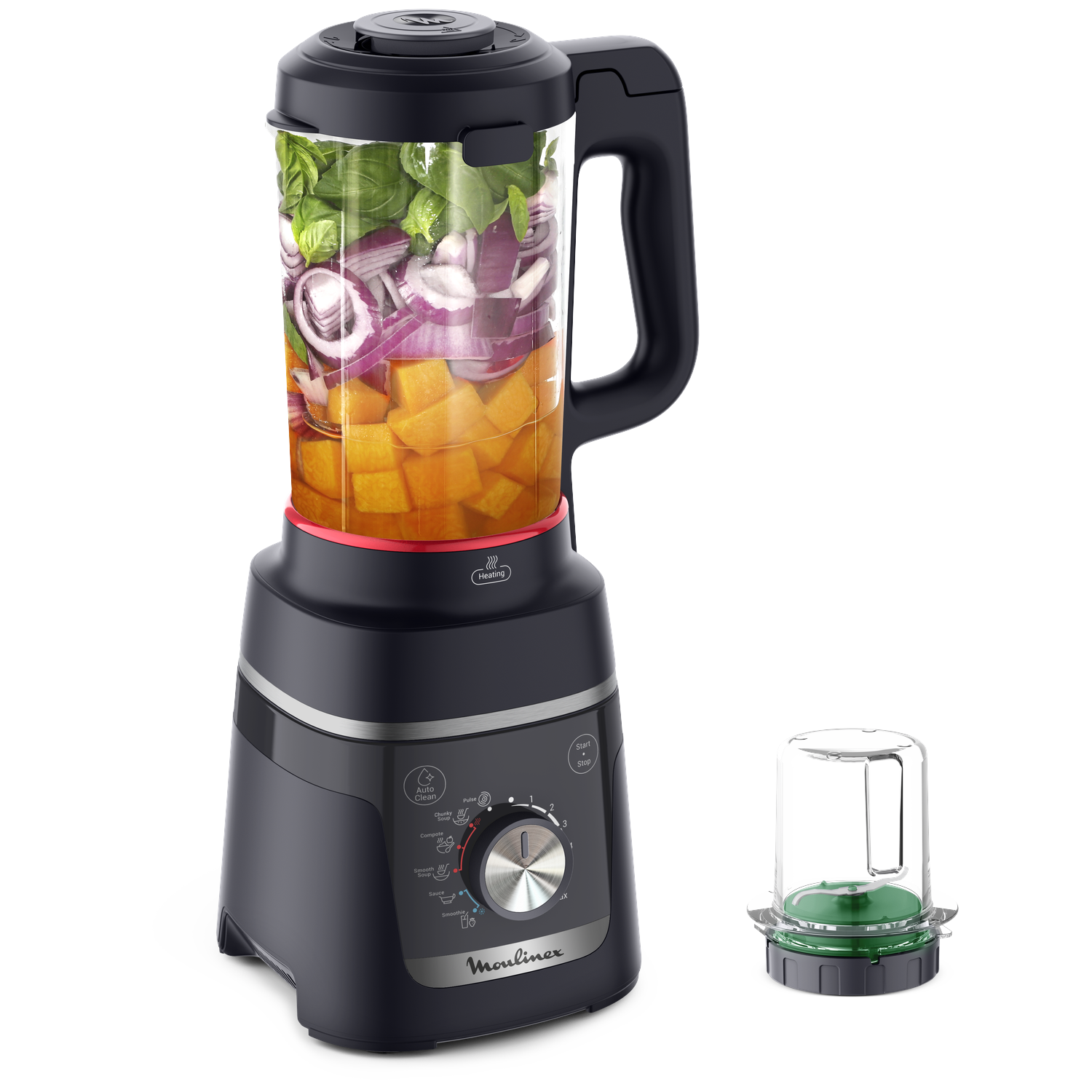 Donkergrijze blender met gehakte uien, pompoen en spinazie in de kan.