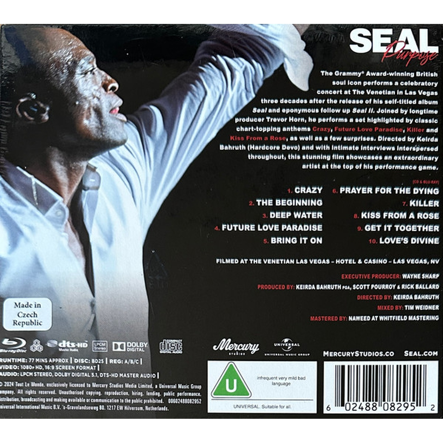 Seal live in Las Vegas: Singer raises arm, tracklist visible.
