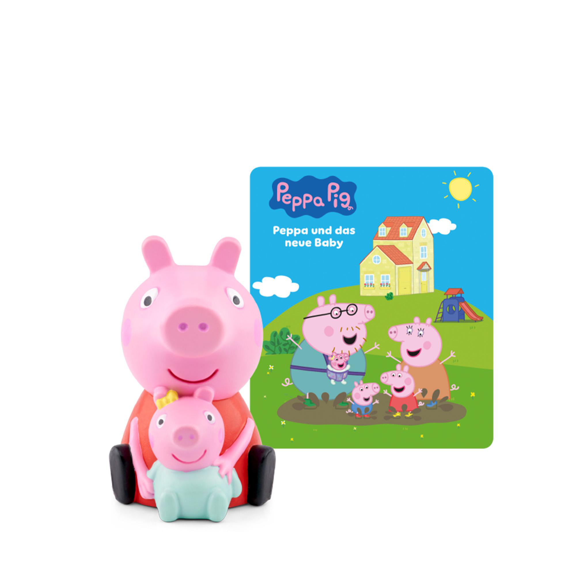 Zwei Peppa Wutz Figuren neben einem Buch mit Peppa Wutz und ihrer Familie.