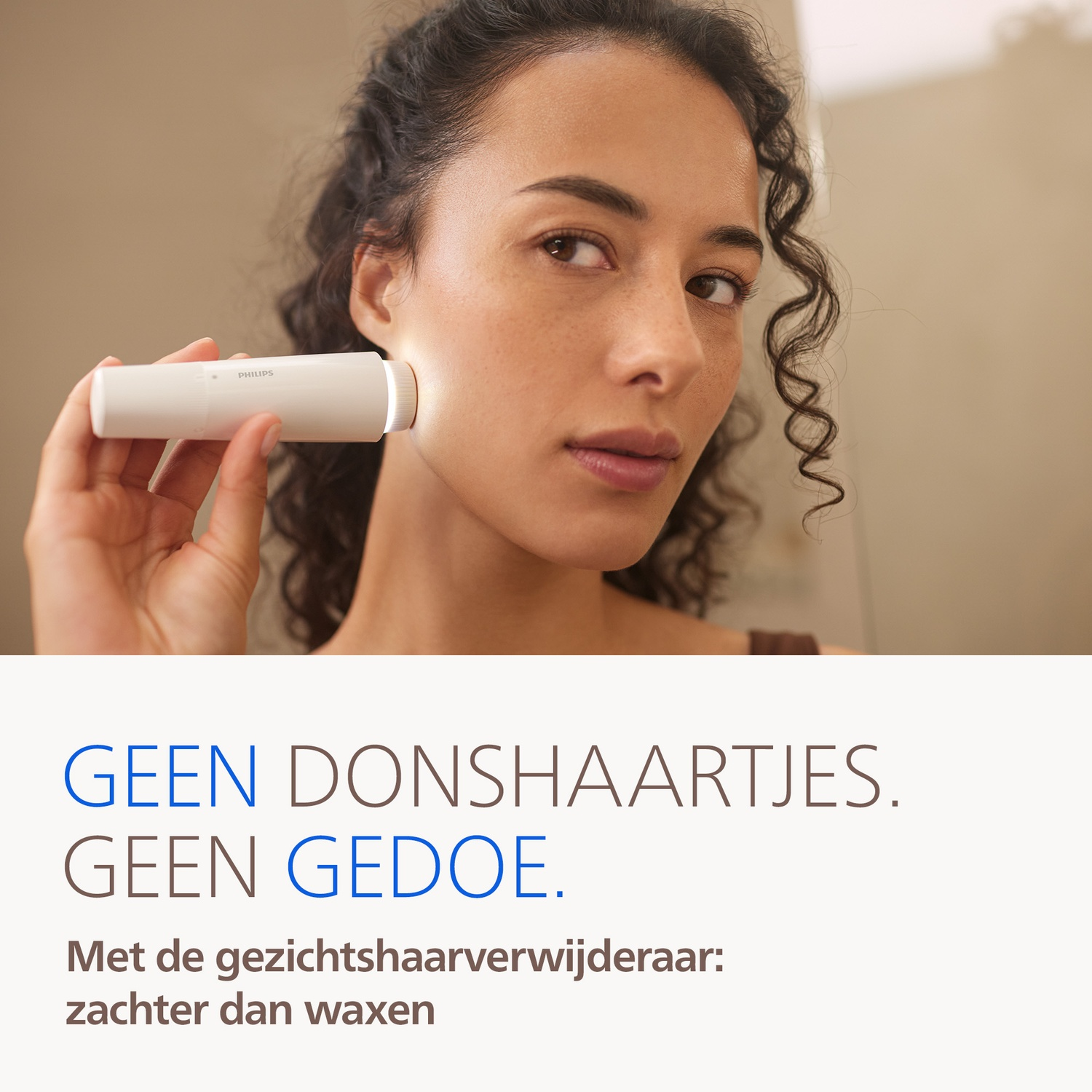 A woman uses a white Philips facial hair remover. Bright light shines.