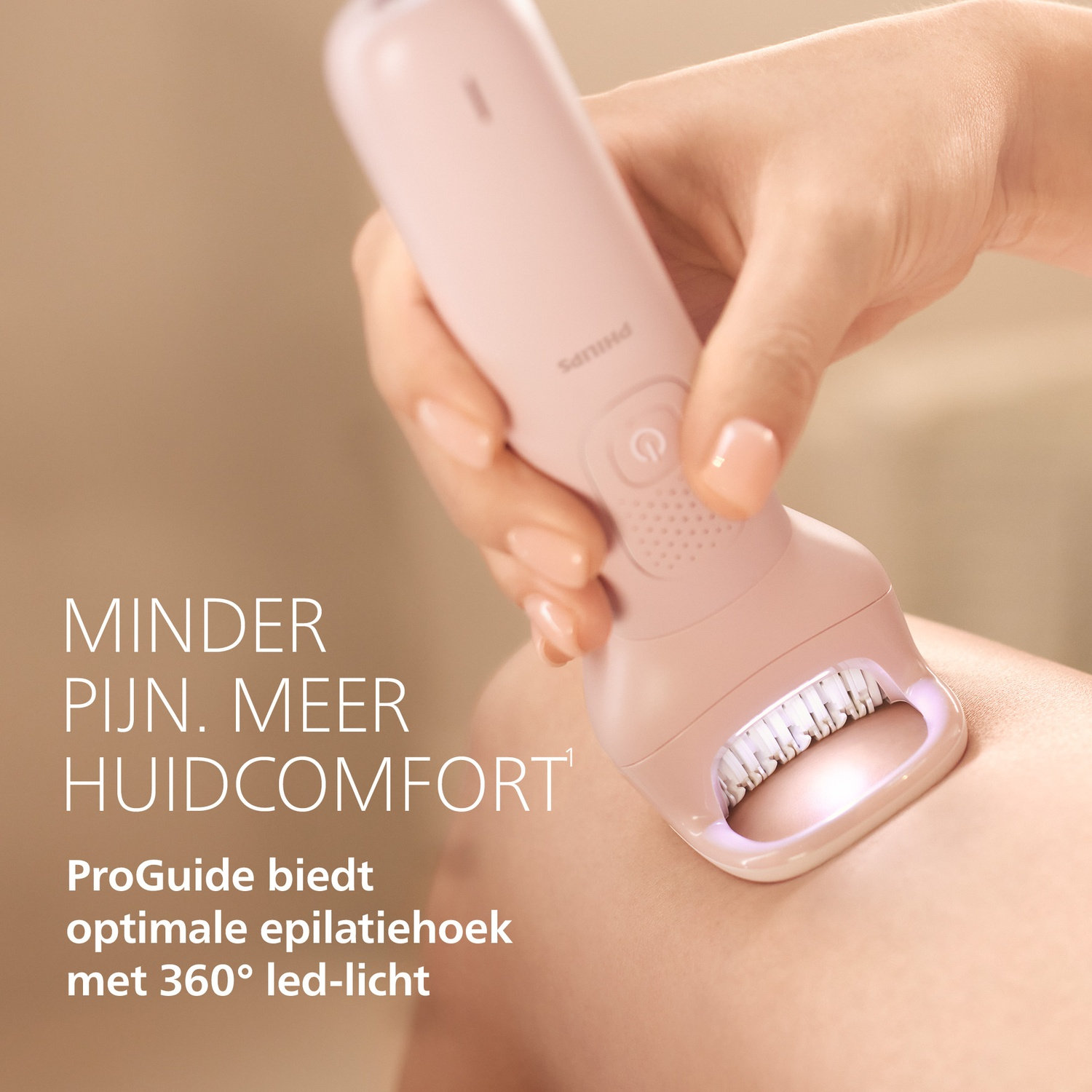 A hand holds a pink epilator on skin. With text.