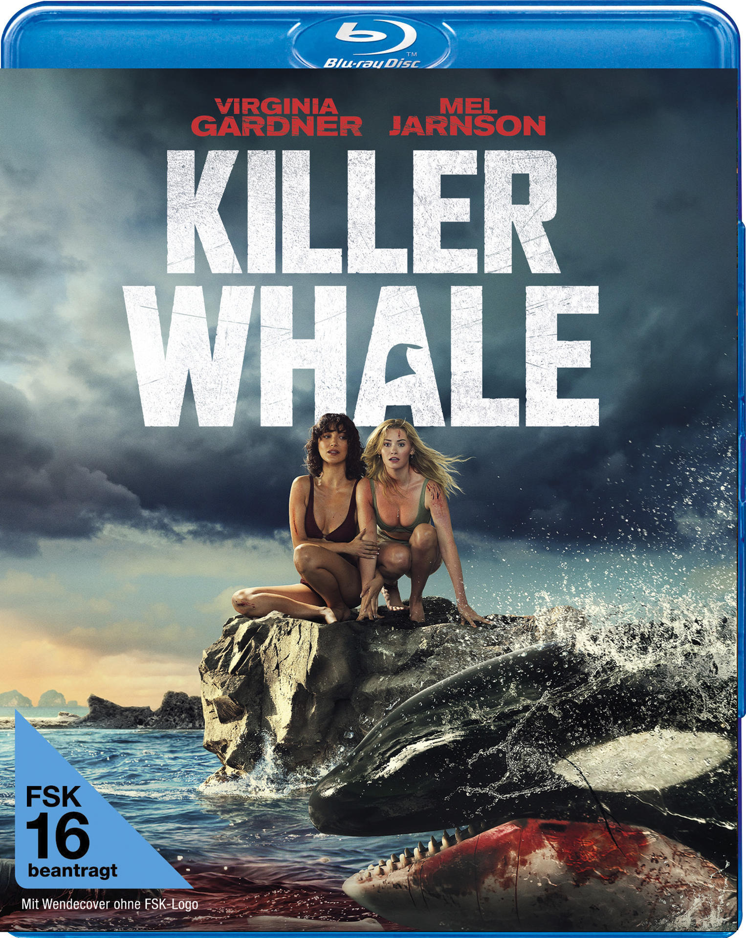 Zwei Frauen sitzen auf Felsen mit einem Orca und einem toten Wal.