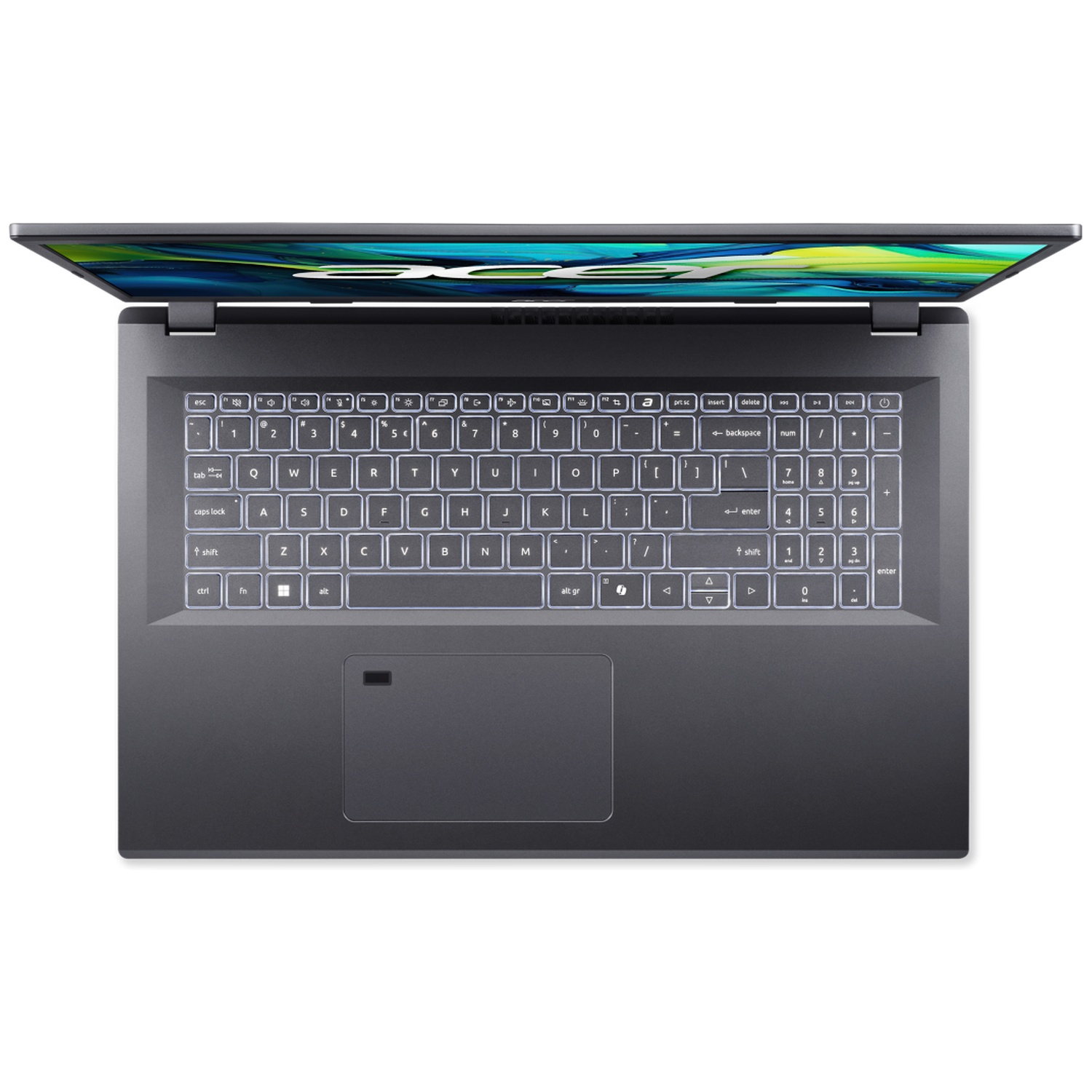 Vue de dessus d'un ordinateur portable gris foncé ouvert, montrant le clavier et l'écran éclairés.