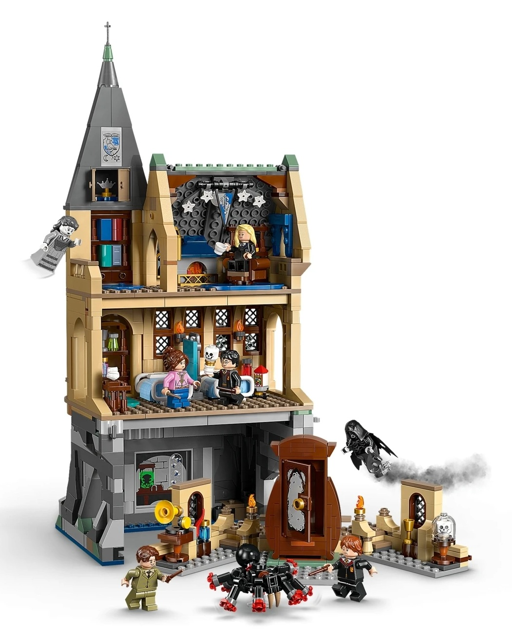 Model Hogwartu z klocków Lego z postaciami i potworem-pająkiem.