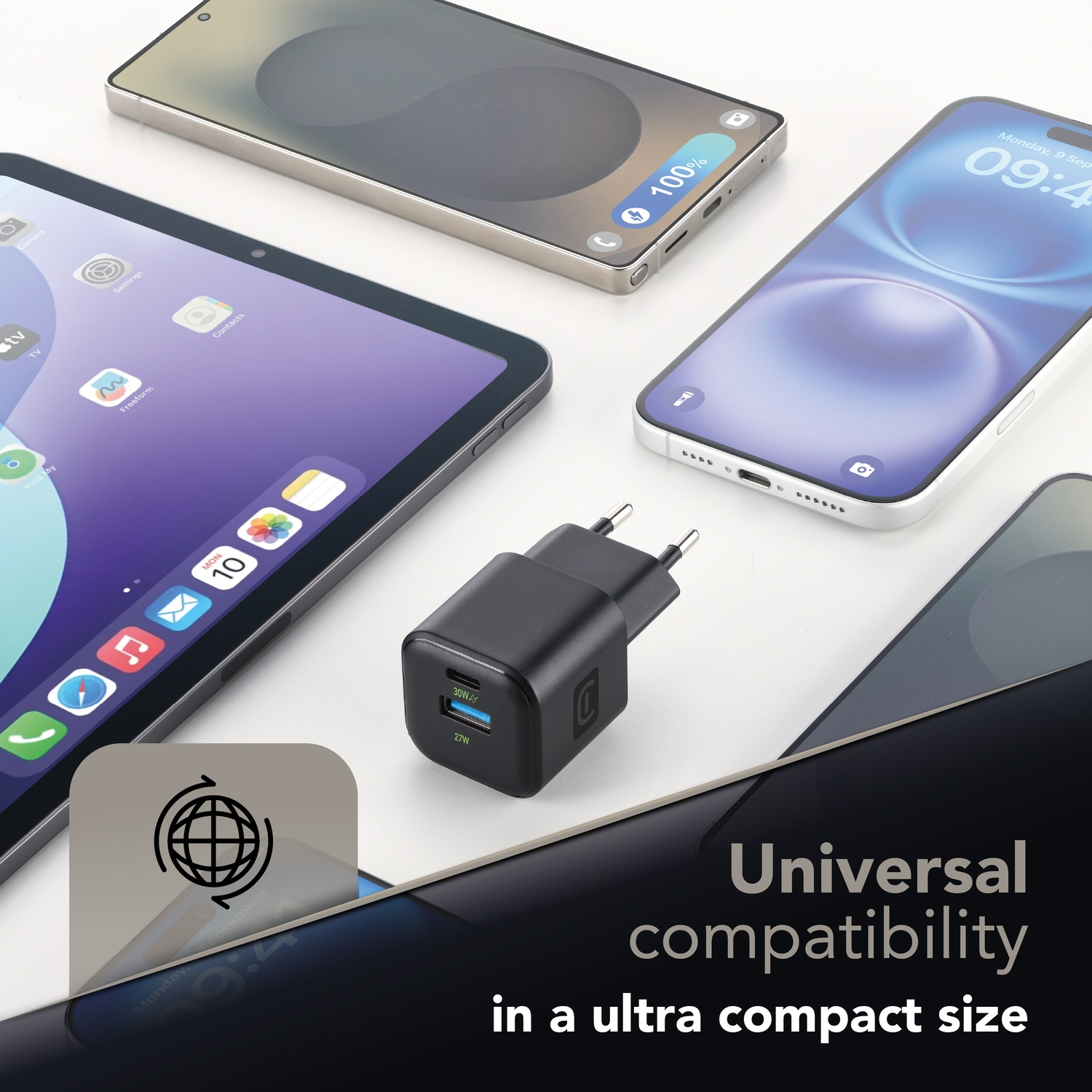 Un caricabatterie nero con diversi smartphone e un tablet.