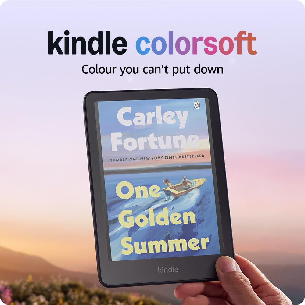 Kindle mit Buchcover 'One Golden Summer' bei Sonnenuntergang.