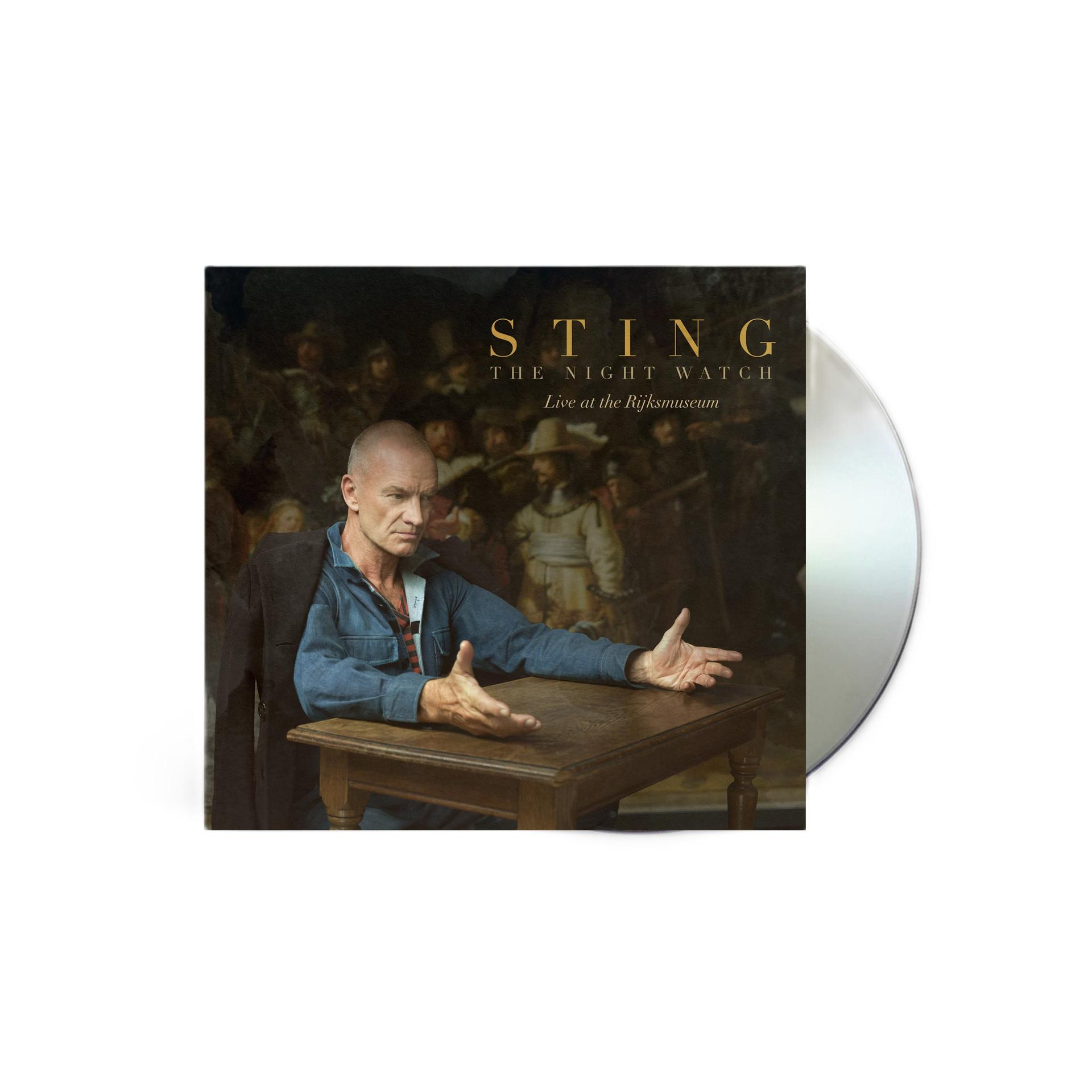 Sting sitzt an einem Holztisch vor Rembrandts Nachtwache. CD daneben.