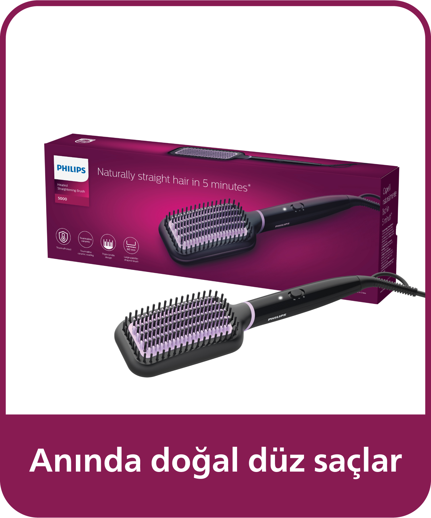 Mor kıllı siyah bir Philips düzleştirici fırça bir kutunun üzerinde duruyor.