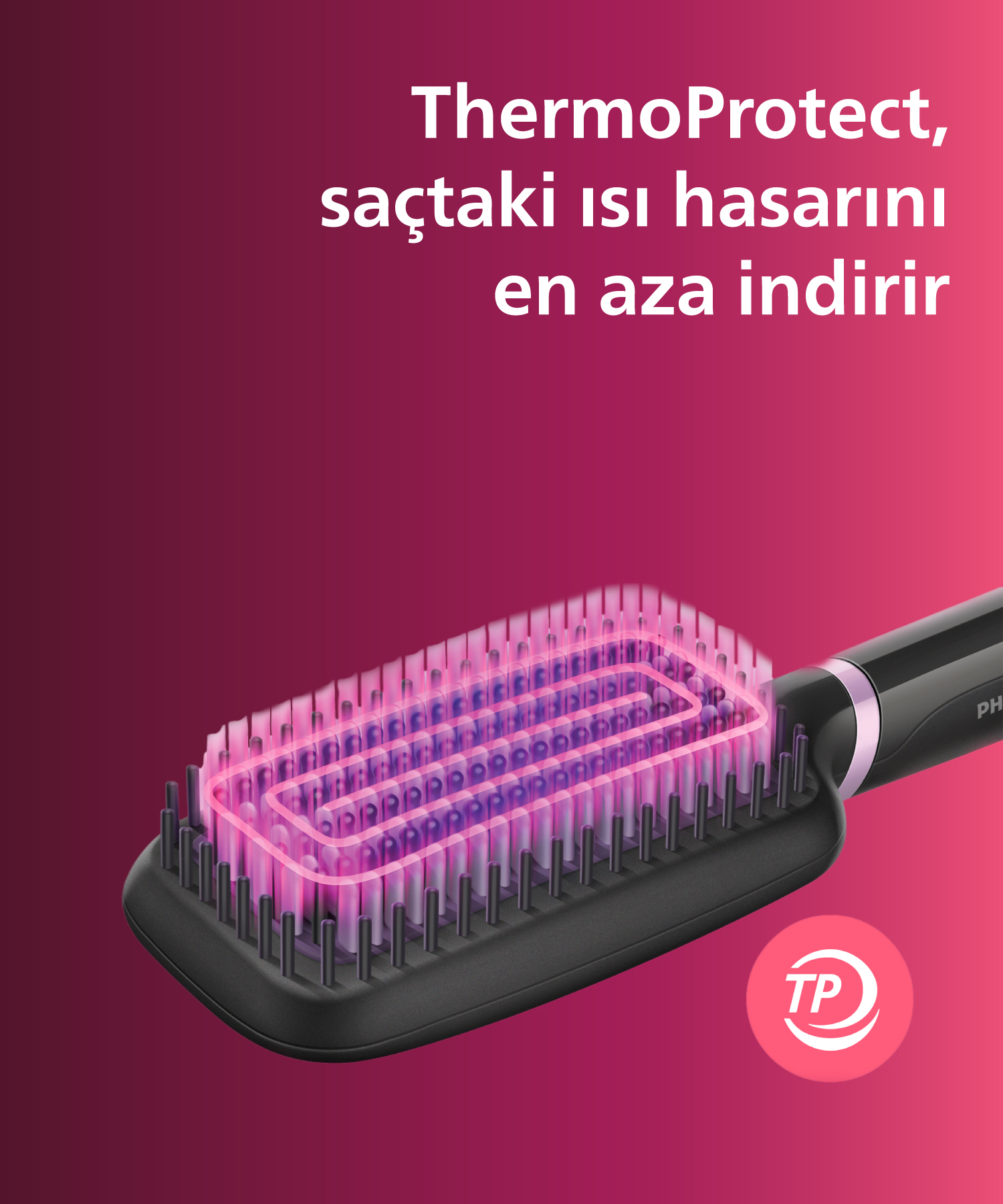 Pembe ısı göstergeli ve TP logolu siyah saç düzleştirici fırça.