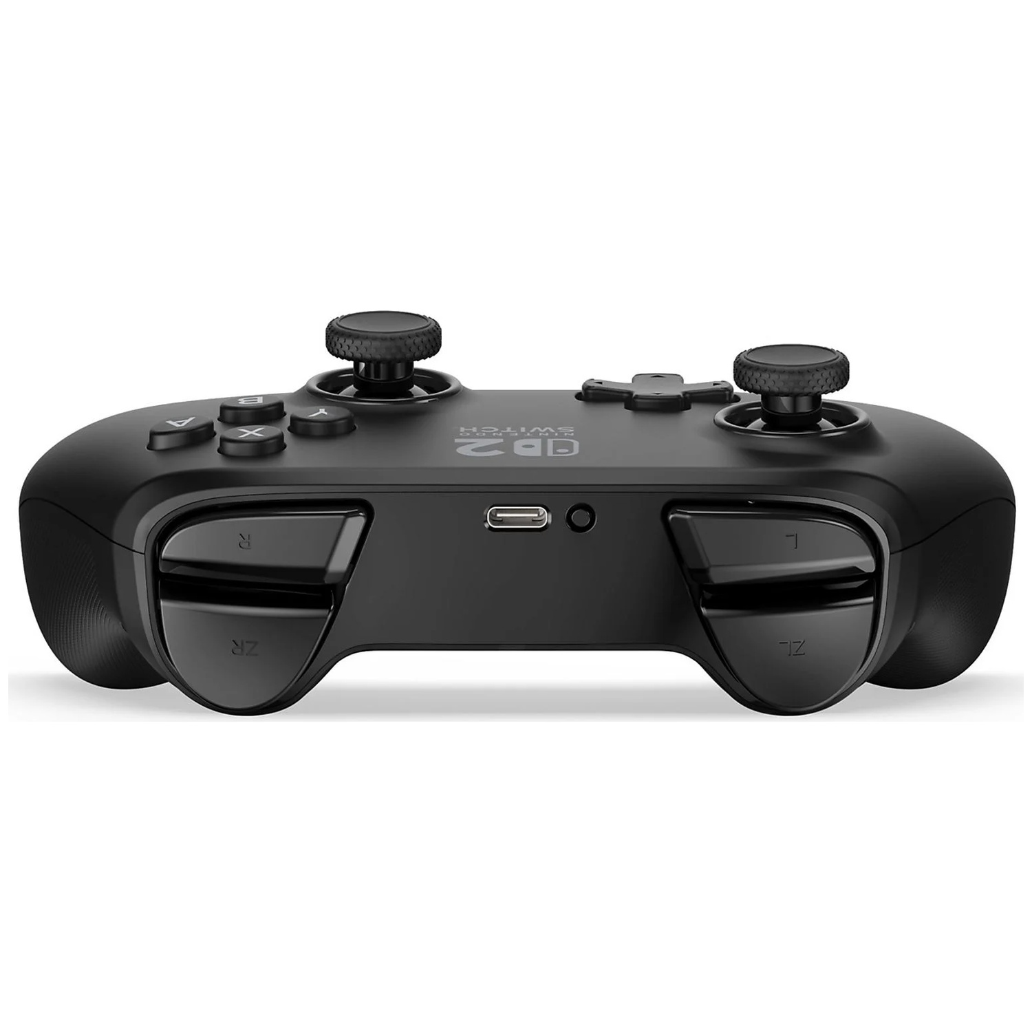 Black game controller with two joysticks, face buttons, and shoulder buttons.