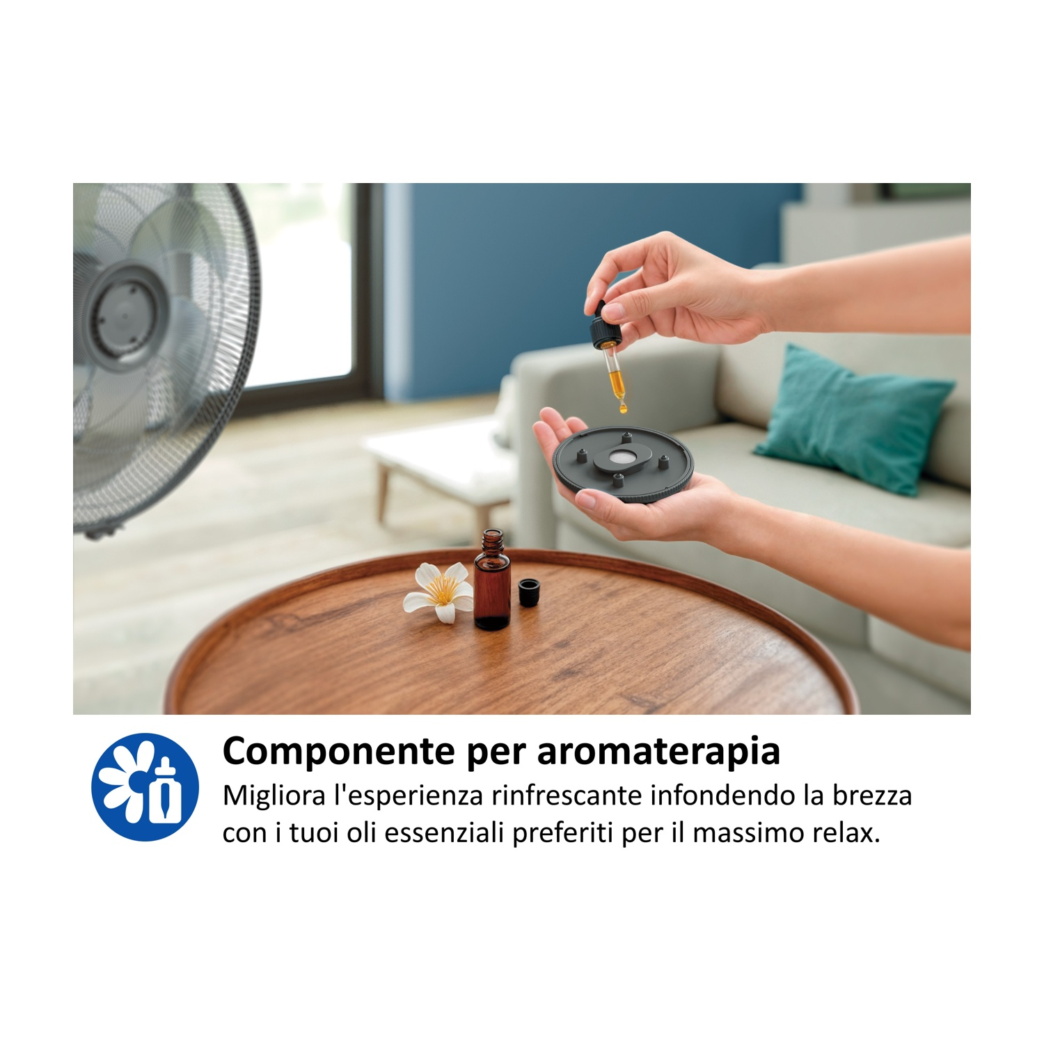 Mani aggiungono olio essenziale a un diffusore vicino a un ventilatore.